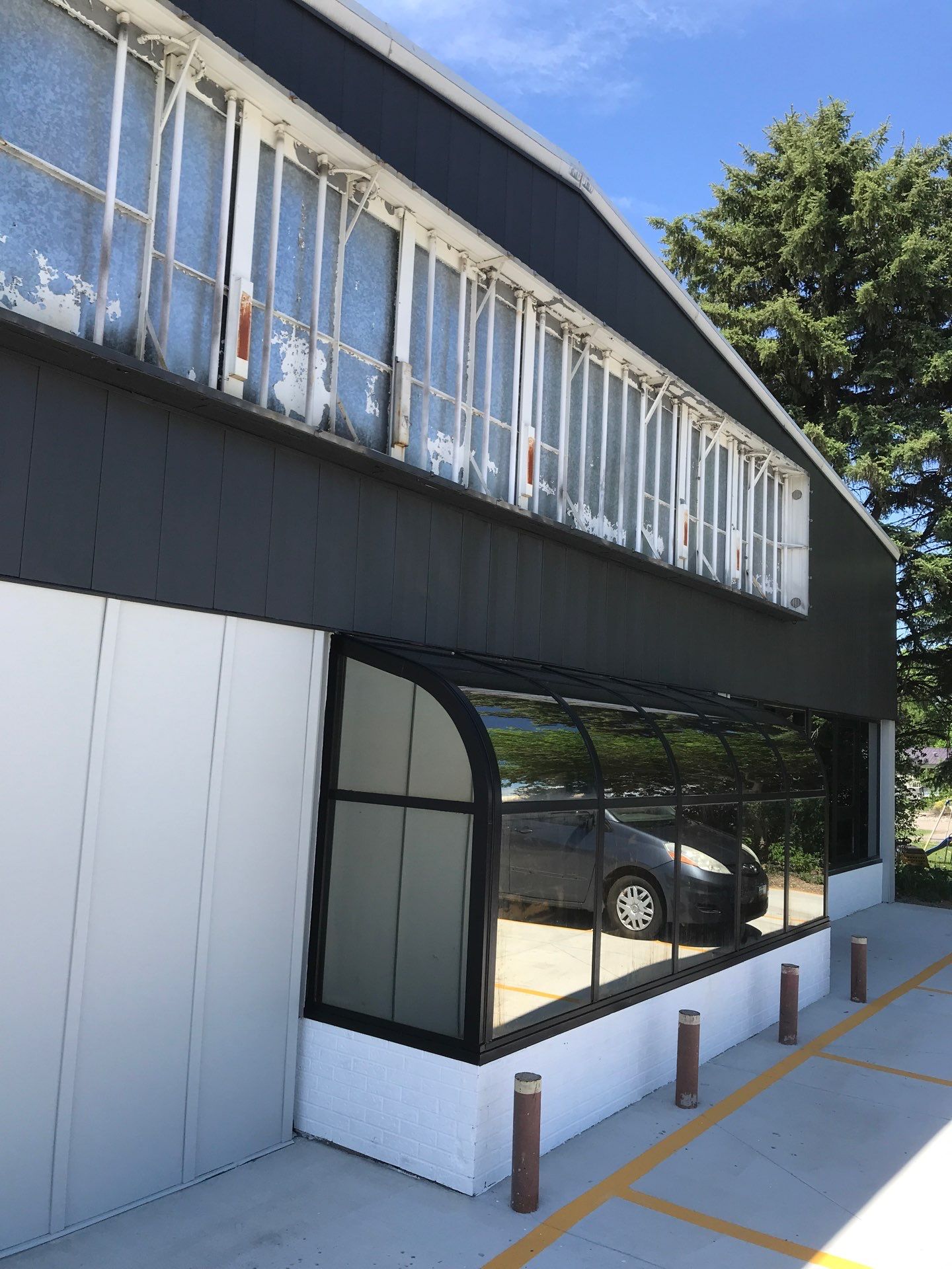 Commercial Shop Renovation and Concrete Parking Installation in Brookings by Select Painting, Coatings & Garage Cabinets