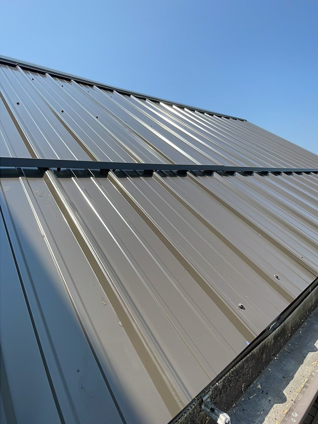 Residential Roofing Installation using Performance Panel Metal - Burnished Slate by RoofX 