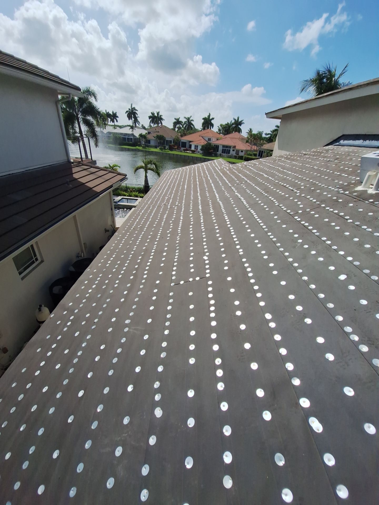 Residential Roofing Installation using 1" Nail strip metal roof by BLUES BROTHERS ROOFING
