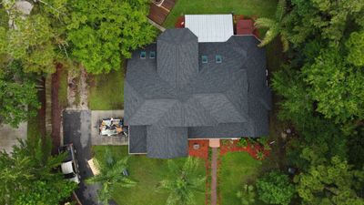 Complete Onyx Black Asphalt Shingle Roof Replacement and Skylight Installation in Jacksonville
