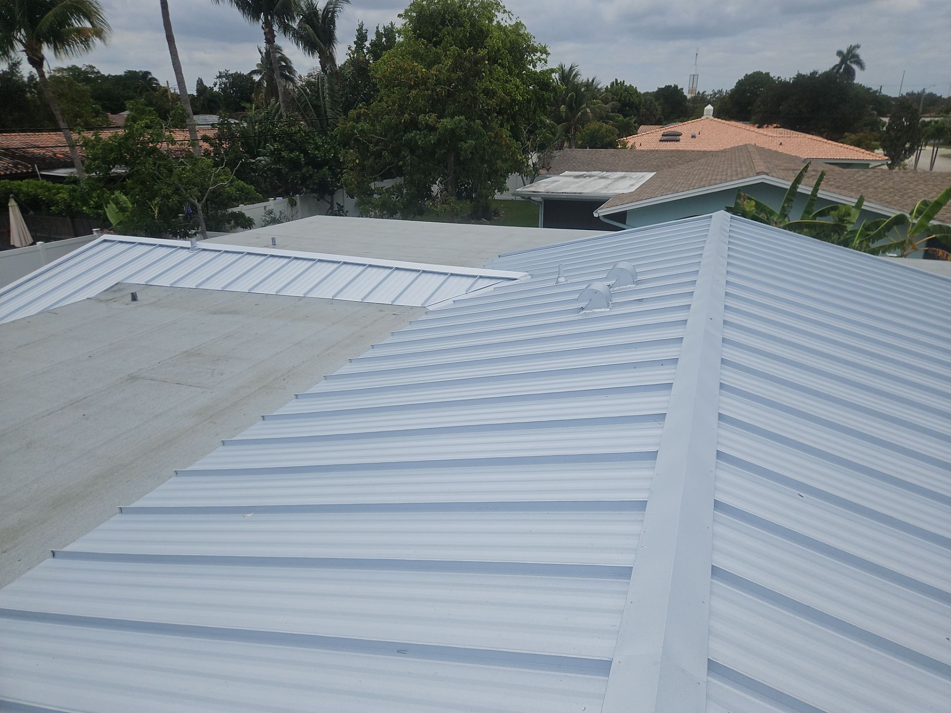 Residential Roofing Installation using 1" Nail strip metal roof by BLUES BROTHERS ROOFING