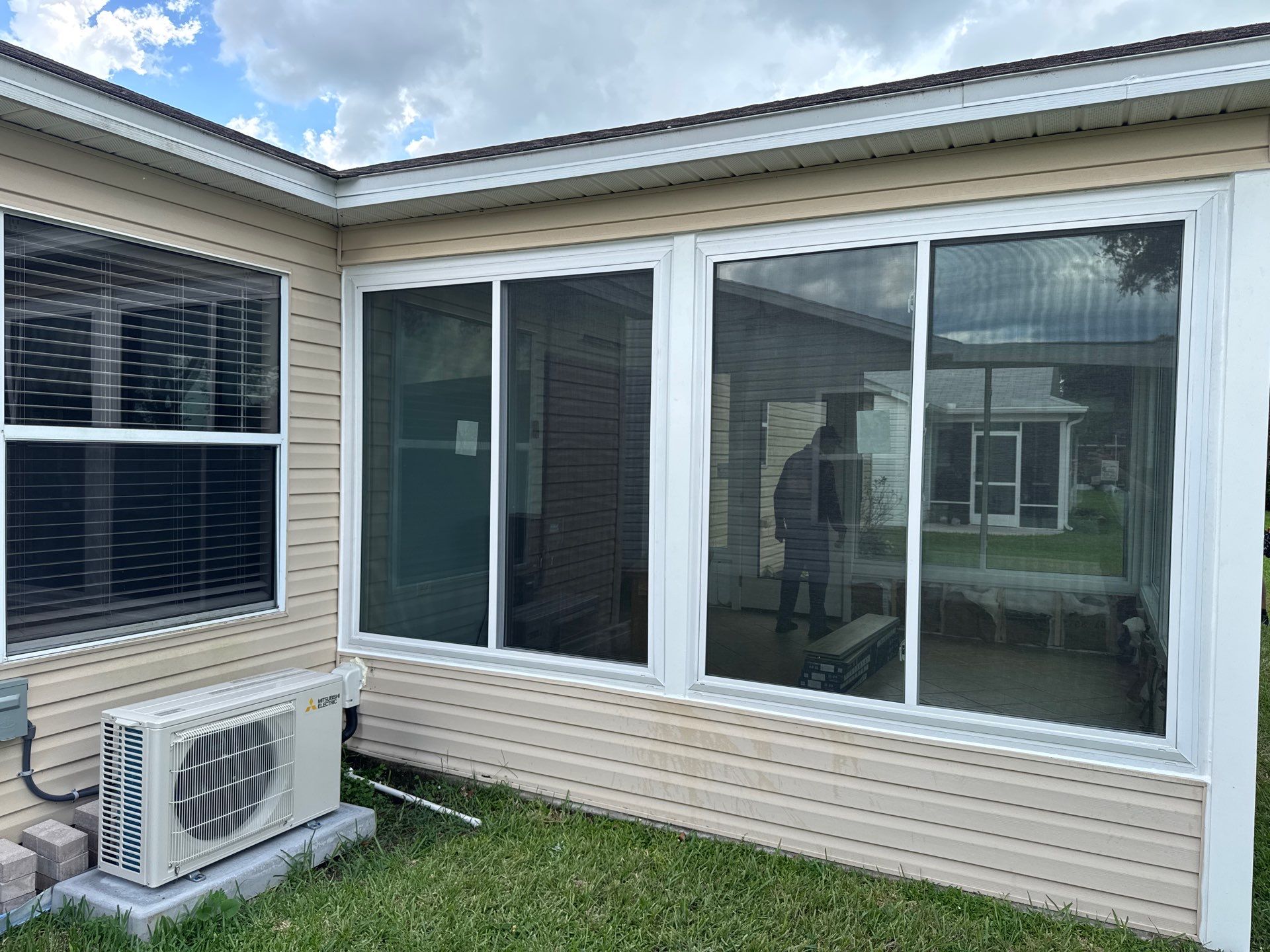 Sunroom Conversion with Alside Windows and Provia Door in The Villages by Windows & Doors Store