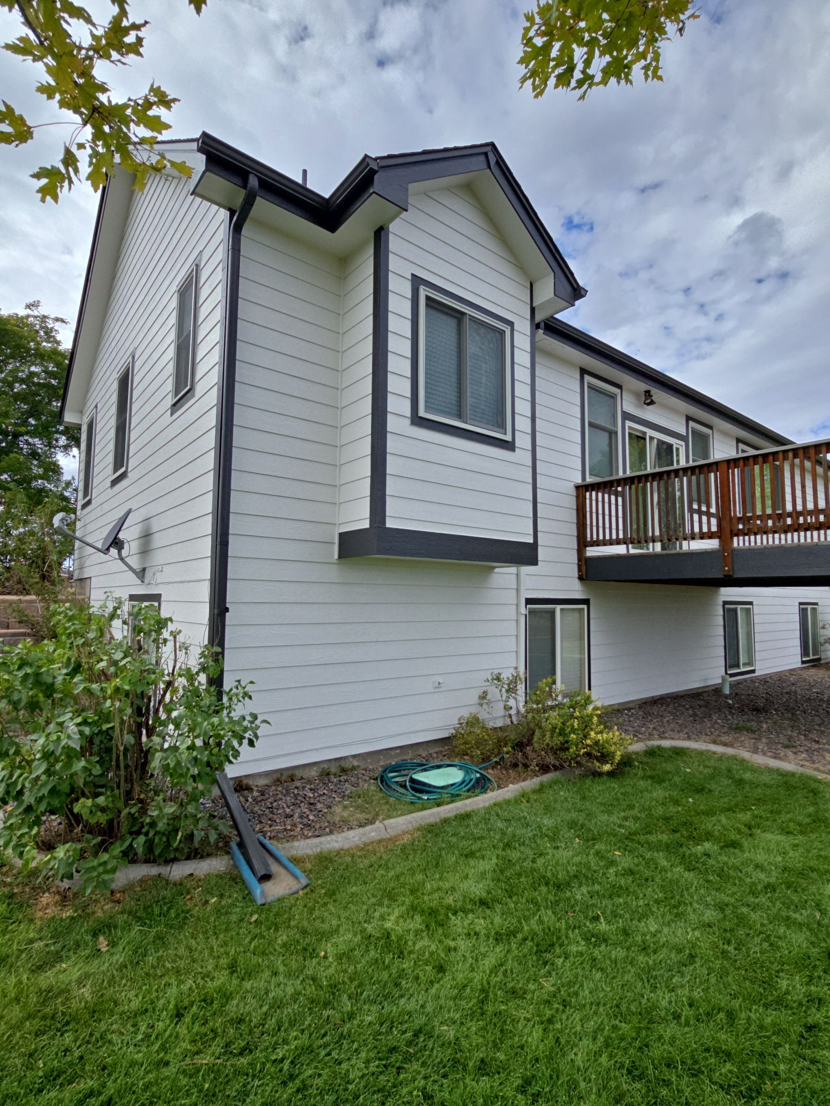 From Faded to Timeless: White & Black Exterior Renewal by J&M Painting LLC