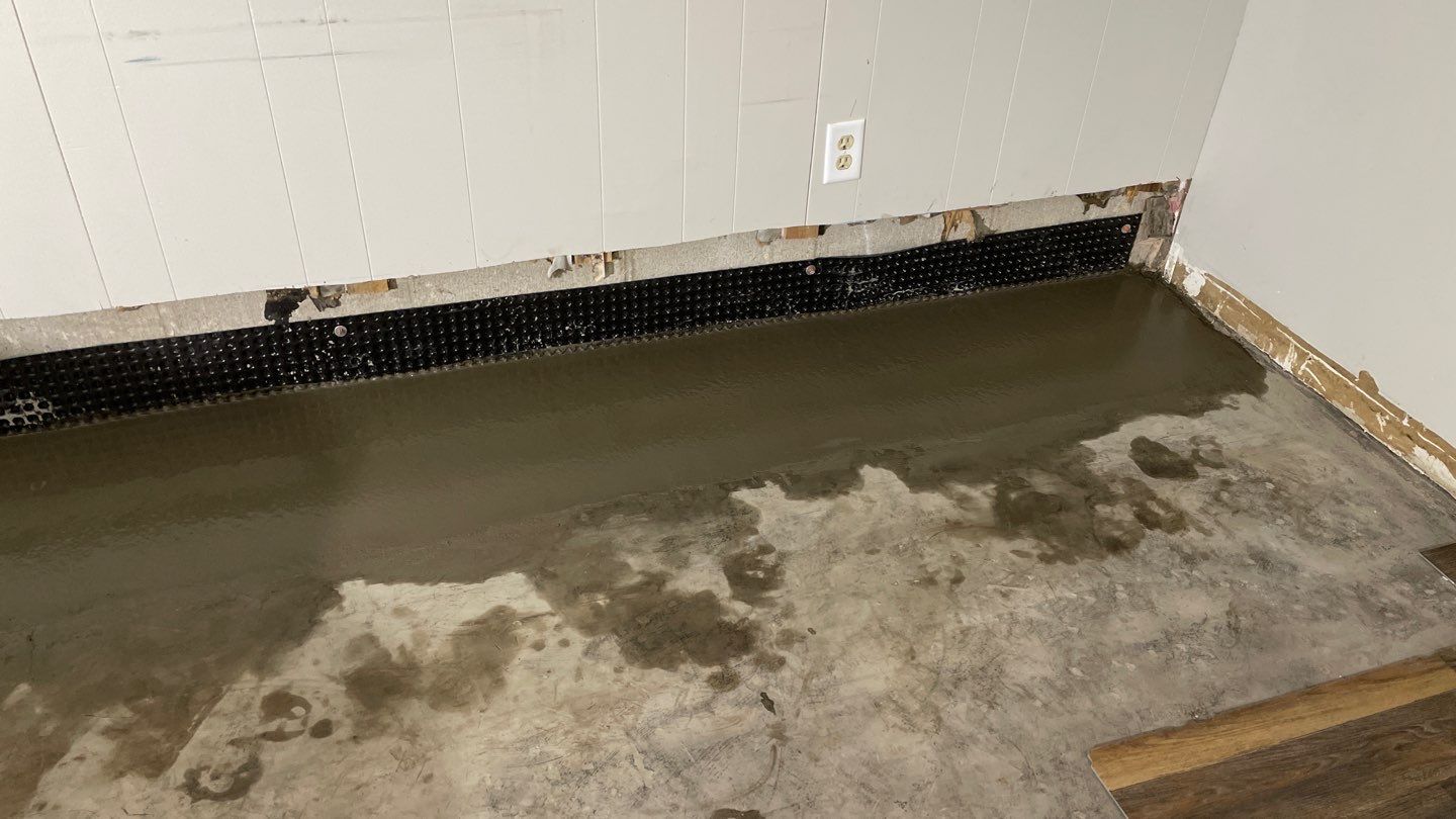 Drain tile and sump pump for George by Waterproofing Northeast