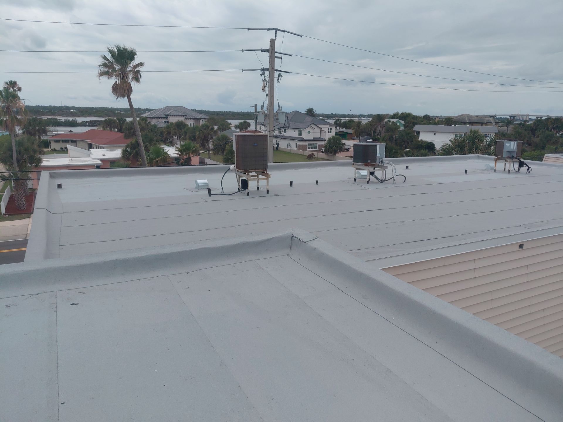 Flat Reroof Replacement Daytona Beach Shores FL by Pinnacle Roofing Group