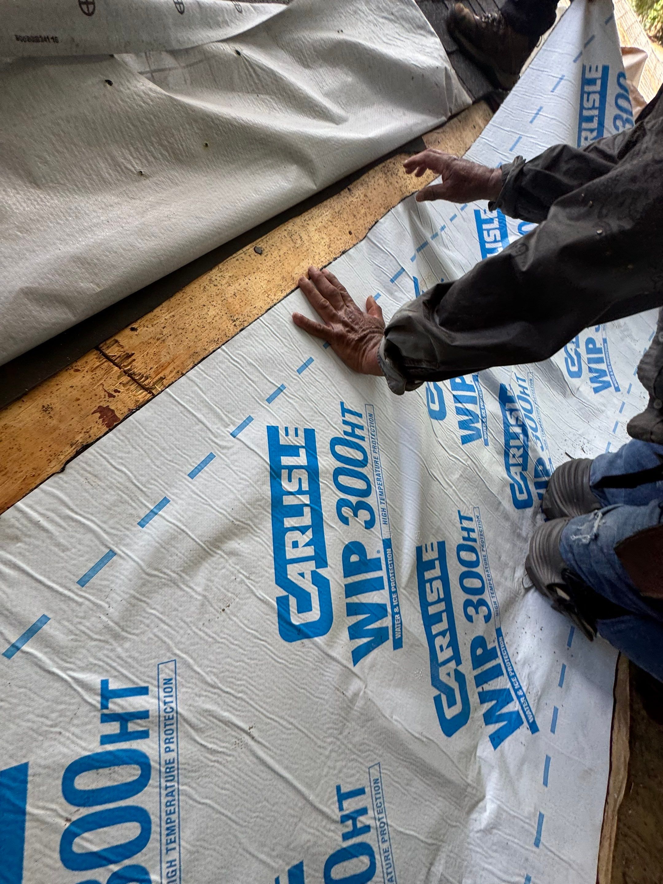 Roof Leak occurring at Sloped Roof-Flat Roof pitch break by Associates Roofing Unlimited 