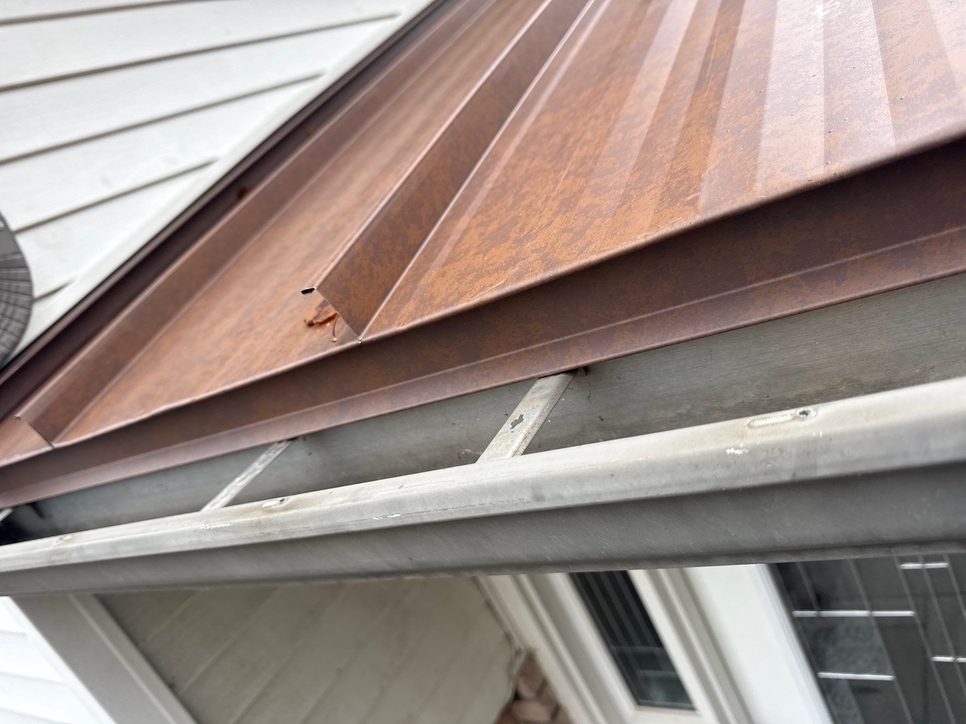 Roof Replacement using MS Standing Seam Roof Western Rust by 180 Contractors