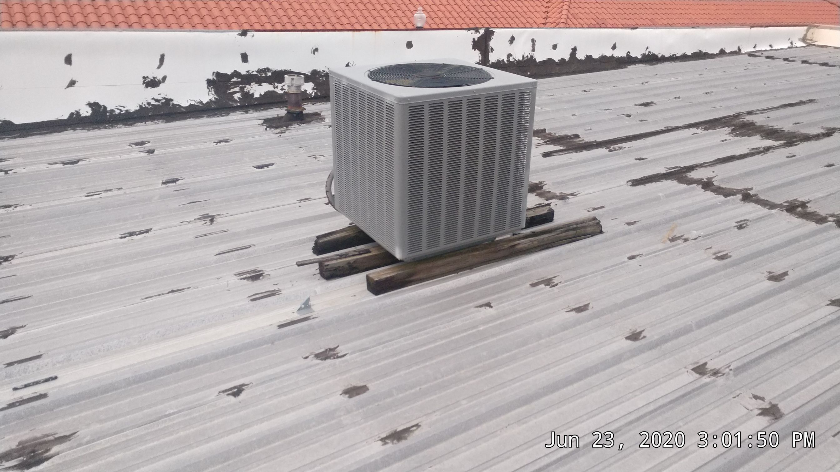 Commercial Metal Restoration System using Aldocoat Coatings by Hostetler Roofing