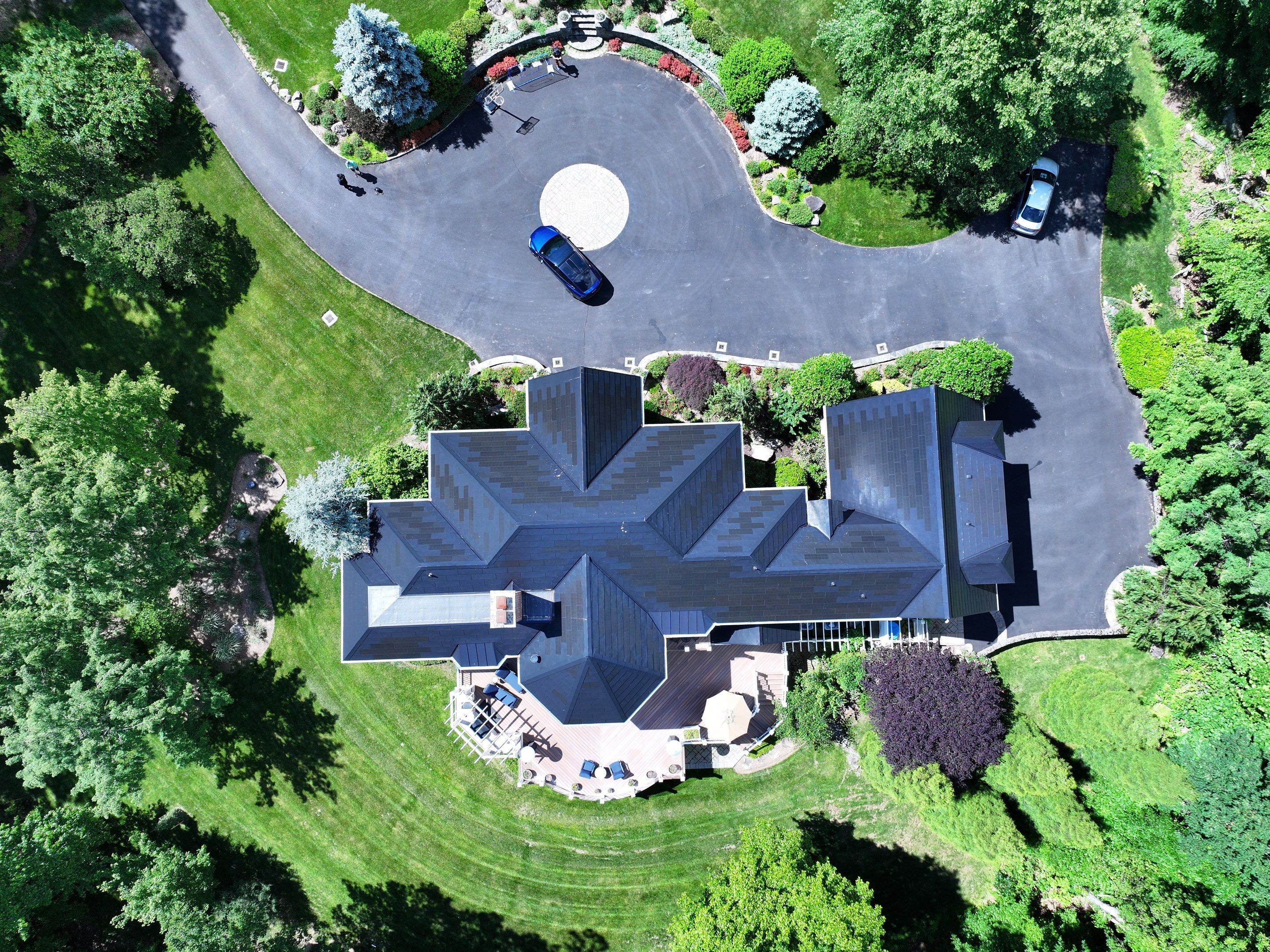 Tesla Solar Roof Replacement by American Home Contractors