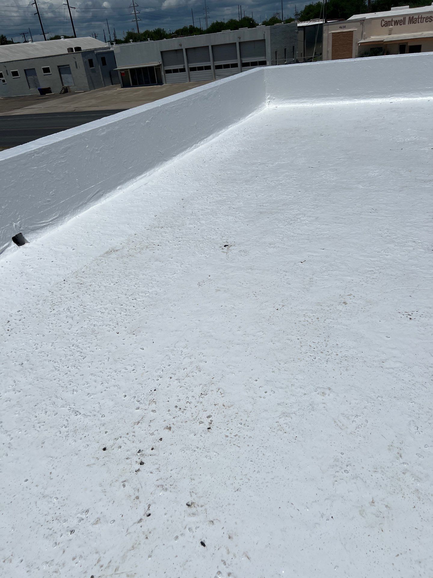 Dirty leaking Gravel Roof by Bayfront Roofing and Construction