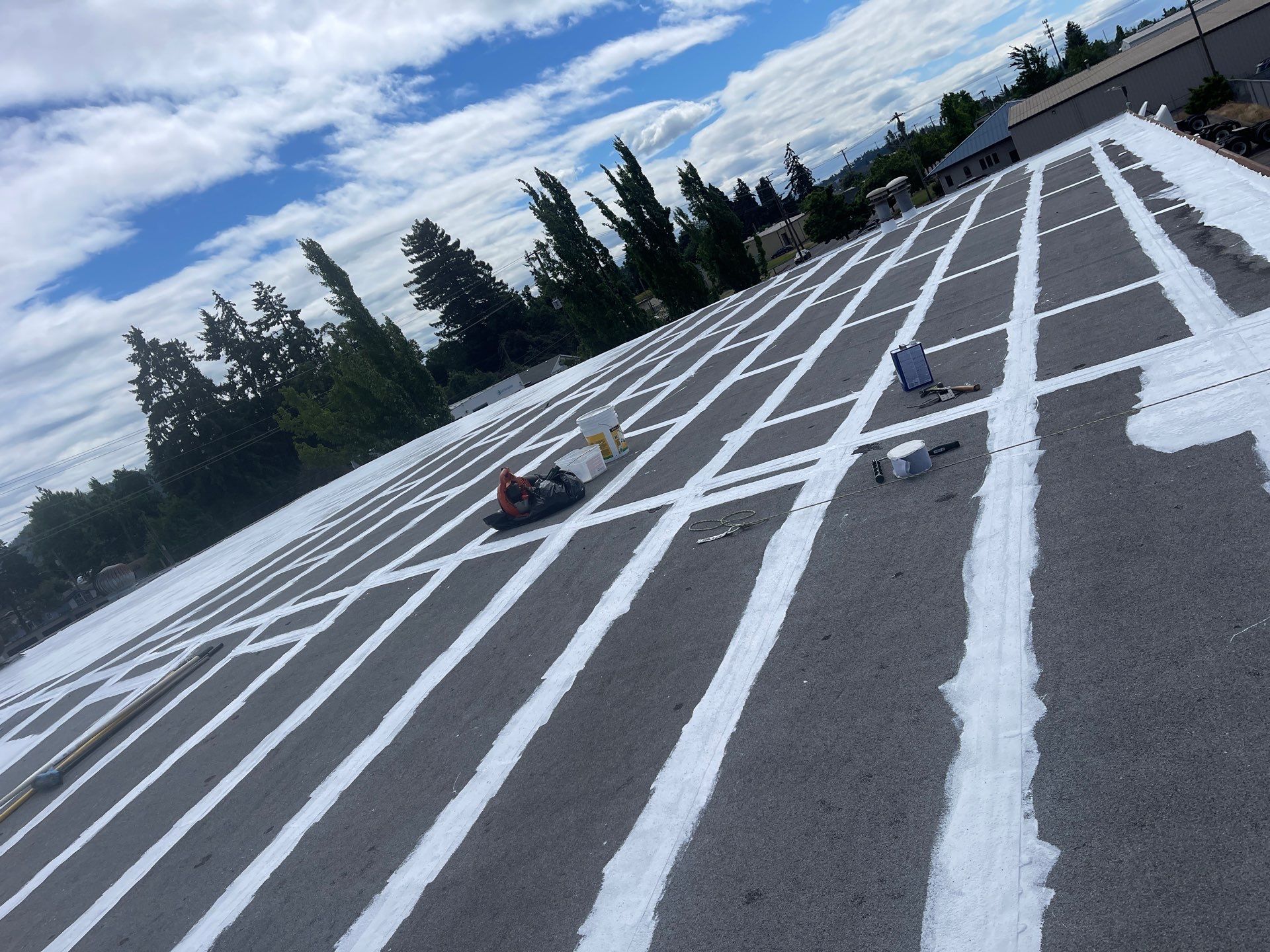 Commercial Roof Restoration and White Coating in Springfield by BEST Roofing & Waterproofing