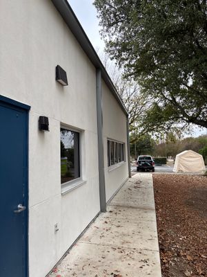 Clean metal roof panel edge on commercial building exterior