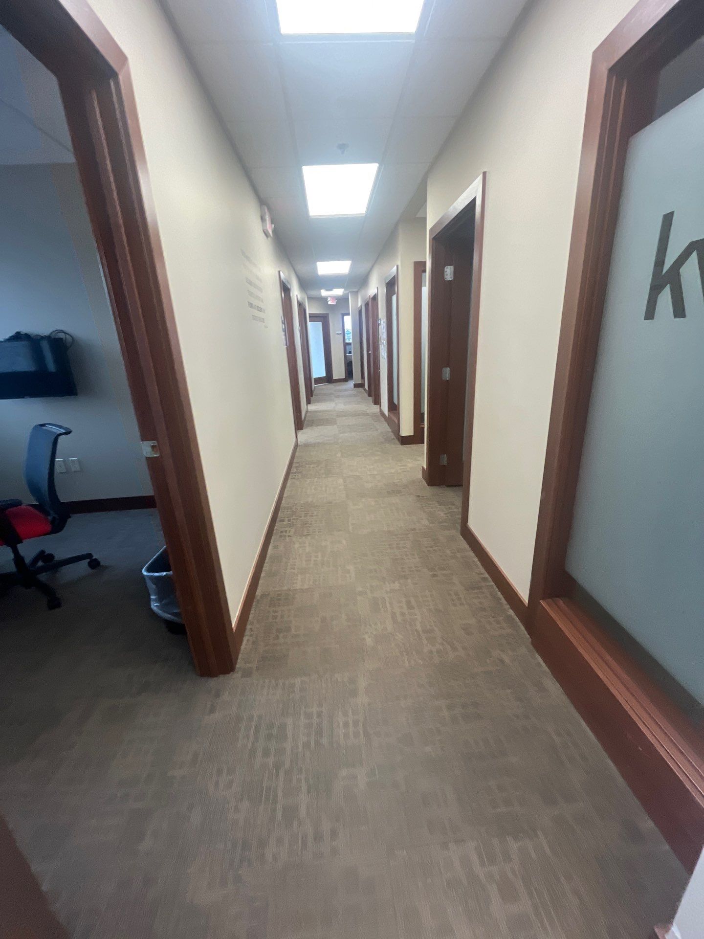 Commercial Office Interior Remodel and Modern Suite Refresh in Sioux Falls by Select Painting, Coatings & Garage Cabinets