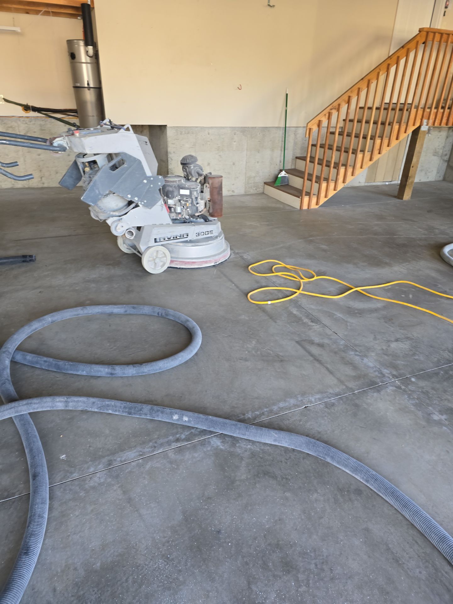 Custom Gray Speckled Polyaspartic Garage Floor Coating in Cheney by Croc Coatings, LLC