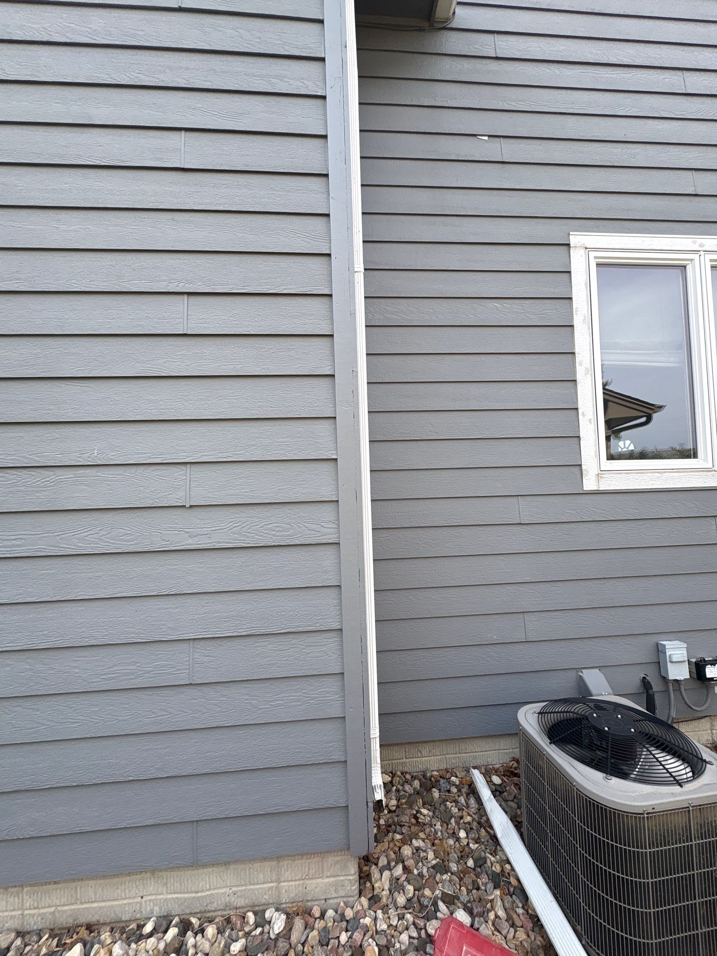 Full Exterior Painting for Gray Siding and Trim in Sioux Falls by Select Painting, Coatings & Garage Cabinets