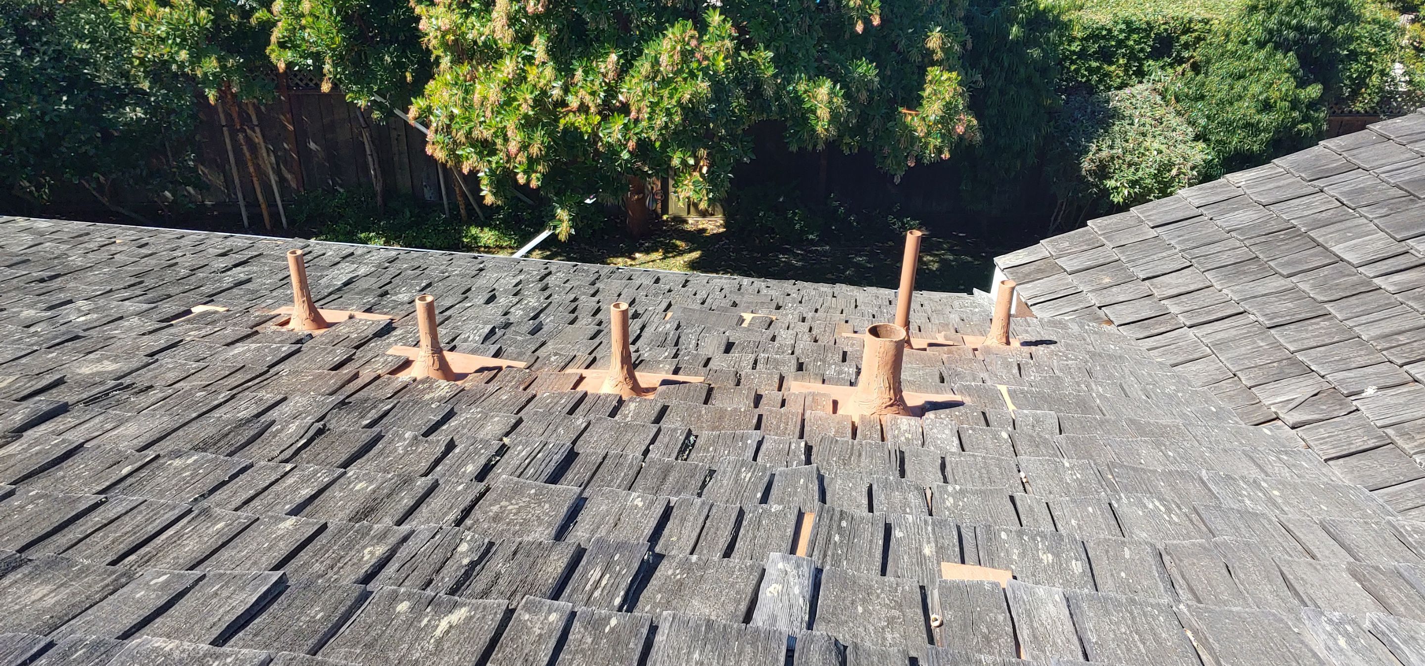 Refurbish and repair shake roof to get ready to sell by Straight Edge Roofing Inc