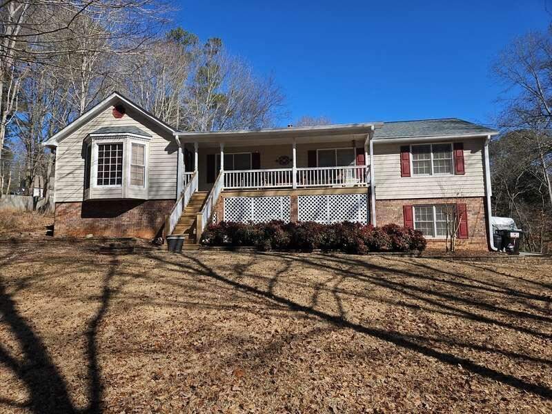 Window, Siding, & Rotten Wood Replacement with Exterior Painting in Woodstock, GA by Nelson Exteriors 