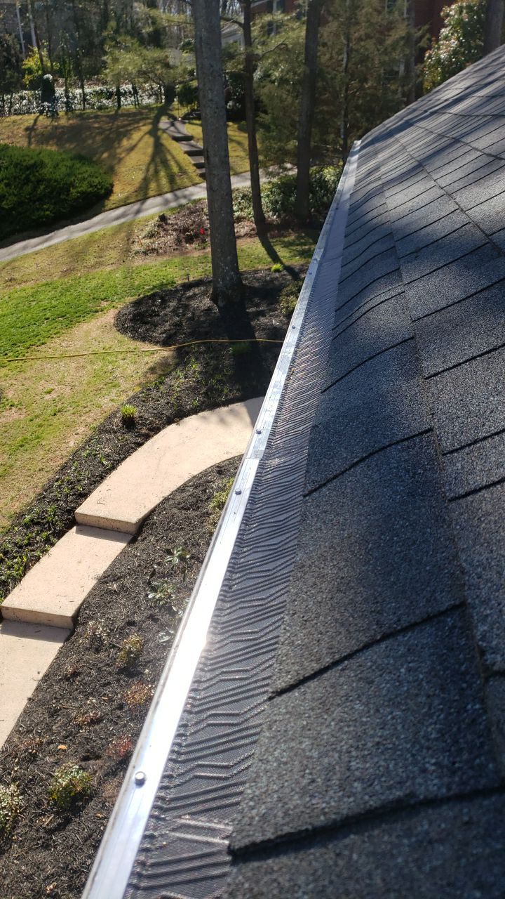 Gutter Cleaning using water by Power Wash Masters LLC