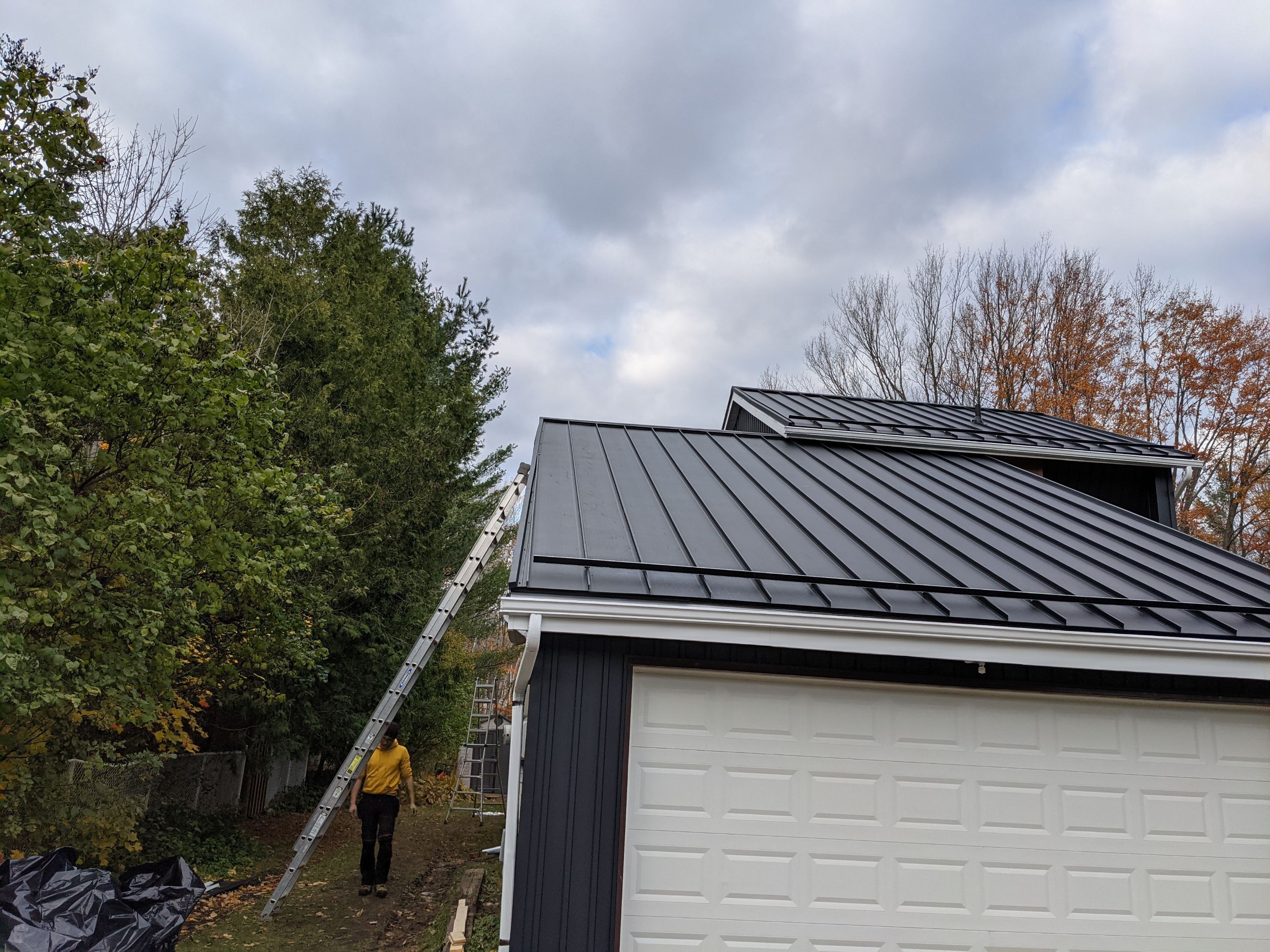 Residential Roofing Installation using 16" Standing Seam Panels by Jay Carter Roofing & Sheet Metal