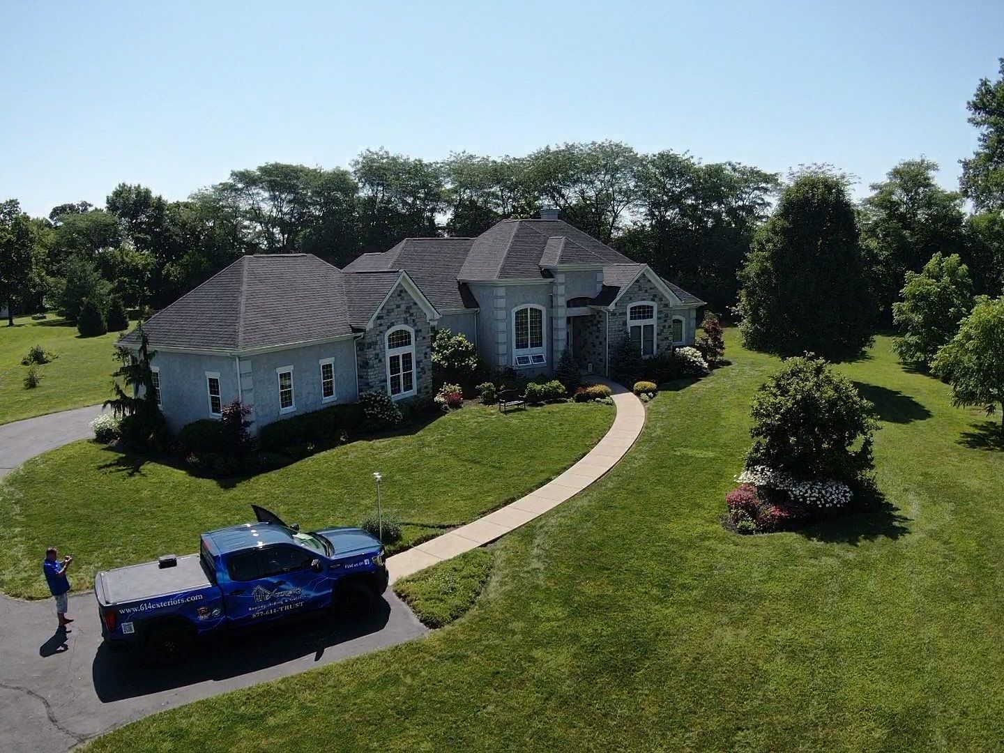 Residential Roofing Installation using Atlas Pinnacle Black Shingles by 614 Exteriors
