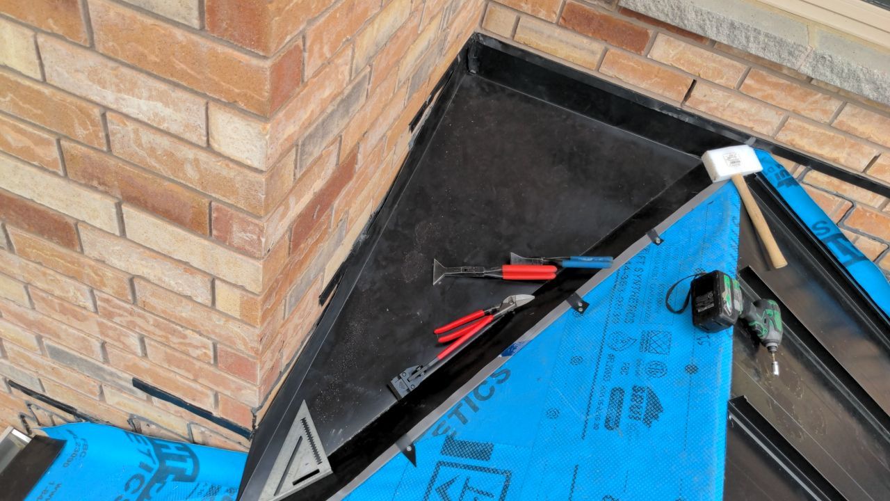 Residential Roofing Installation using 16" Standing Seam Panels by Jay Carter Roofing & Sheet Metal