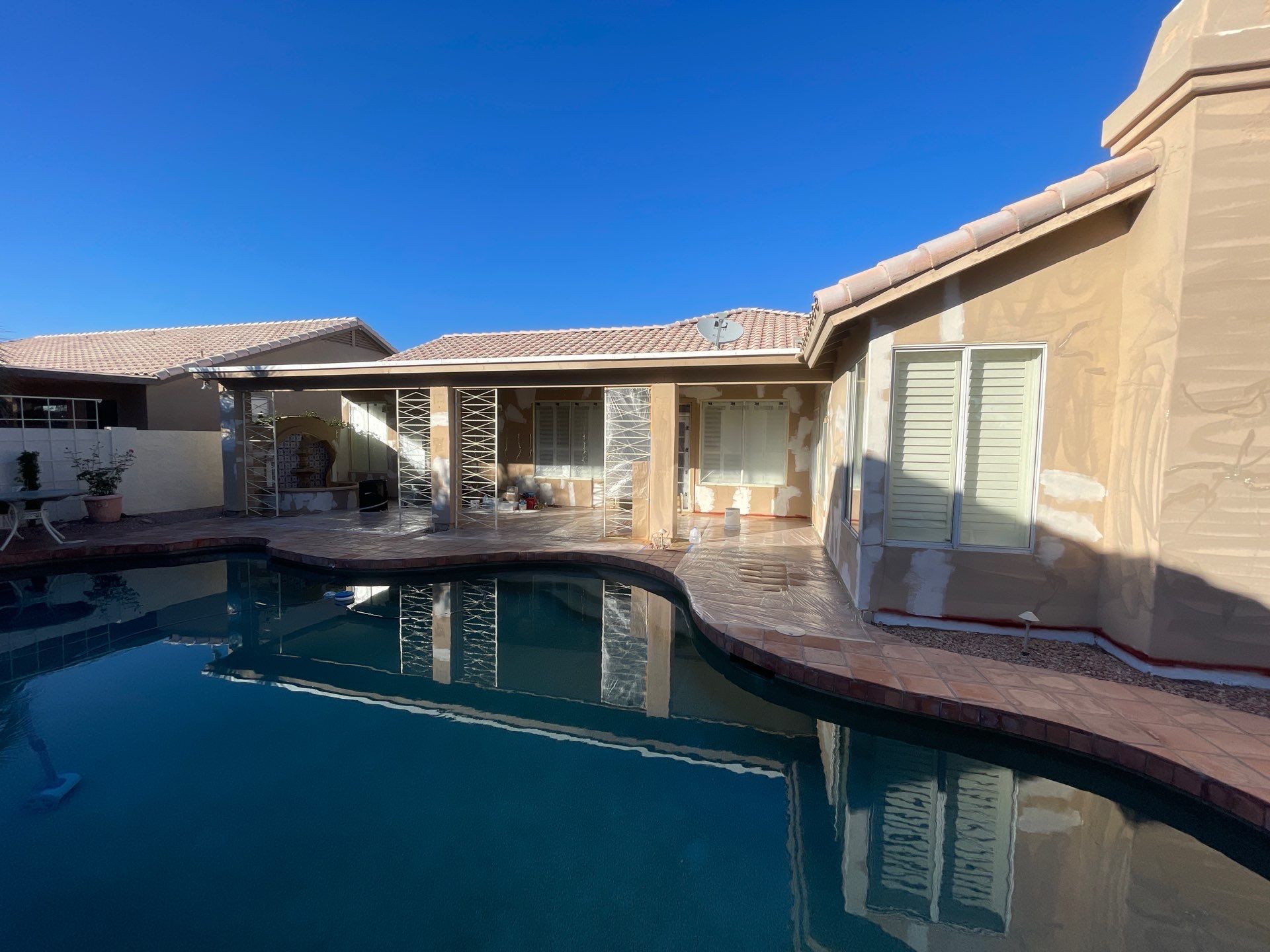 Gazzo - A Beautiful Home Exterior Transformation in Scottsdale, AZ with C&M Primer and Sherwin Williams Paints by Double G Painting Contractors, LLC
