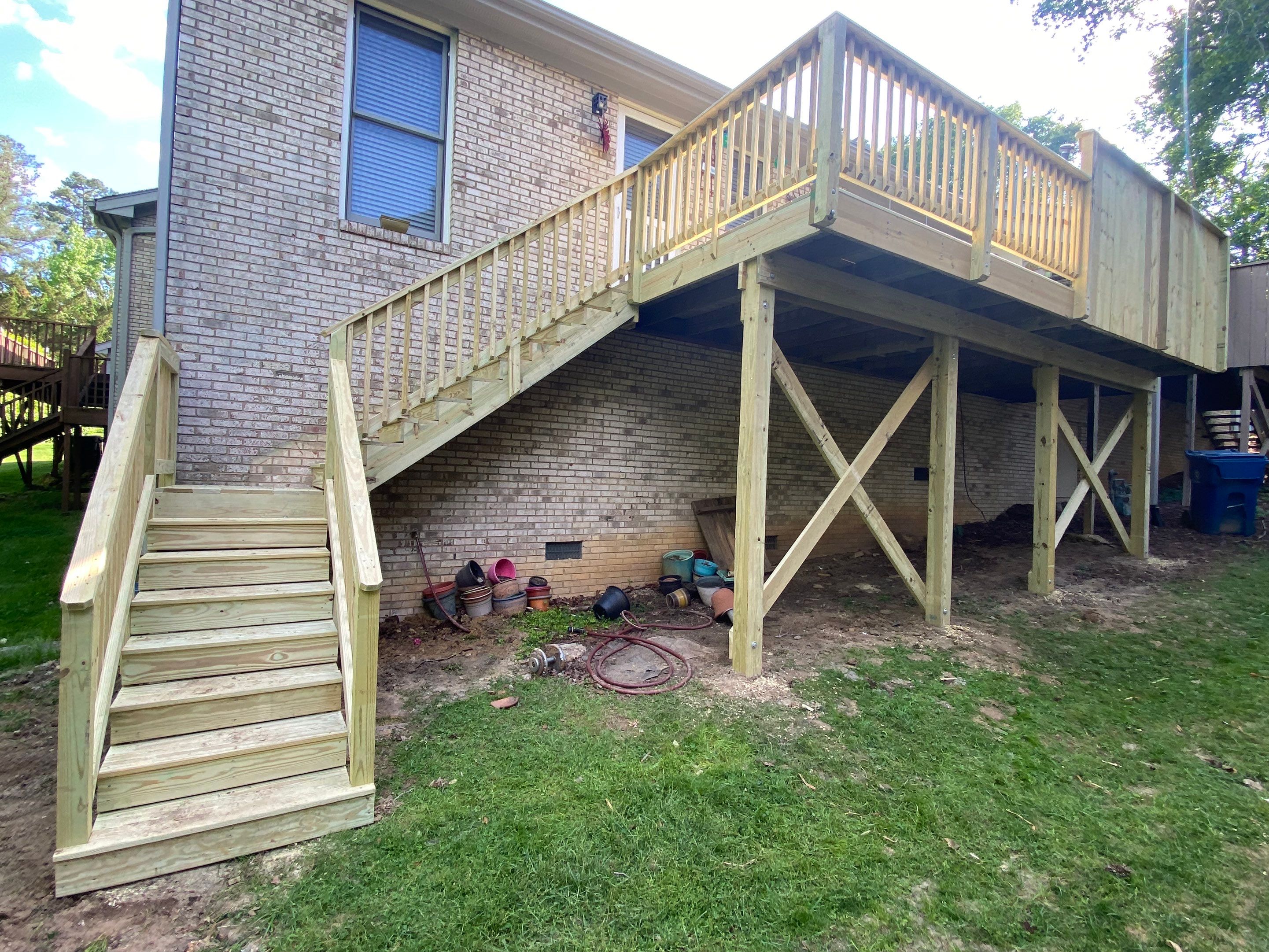 Pressure-Treated Deck Resurfacing and Custom Privacy Railing in Durham by The Remodeling Company