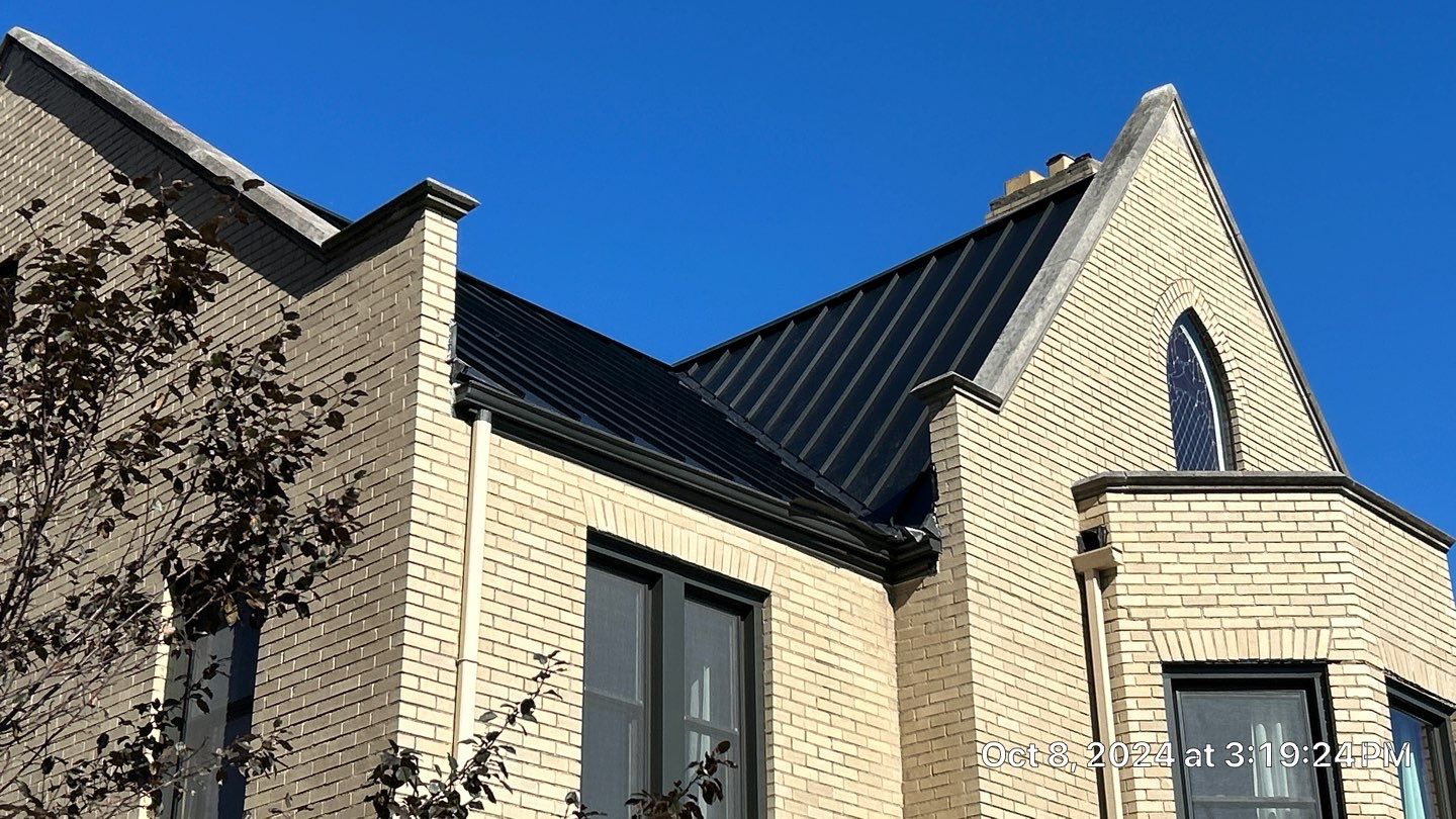 Commercial Roofing Installation using Standing Seam Metal - Frost Black by RoofX 
