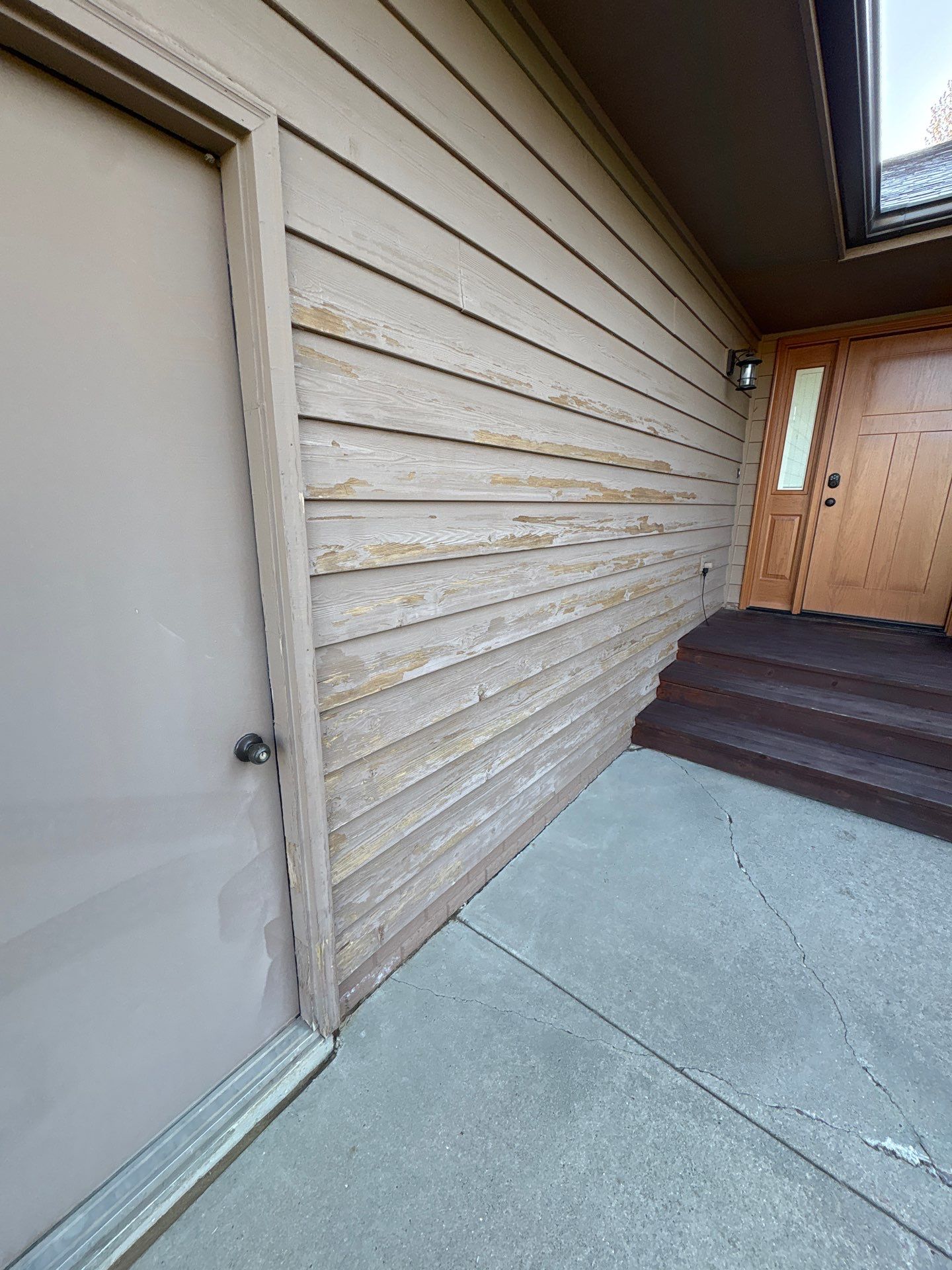Wood Siding Restoration and Exterior Painting in Sioux Falls by Select Painting, Coatings & Garage Cabinets
