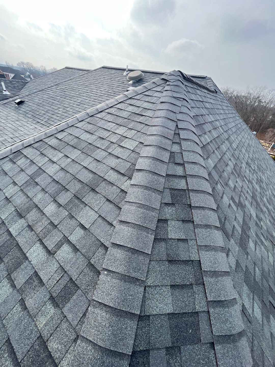 Estate Gray Shingles by Reimagine Roofing