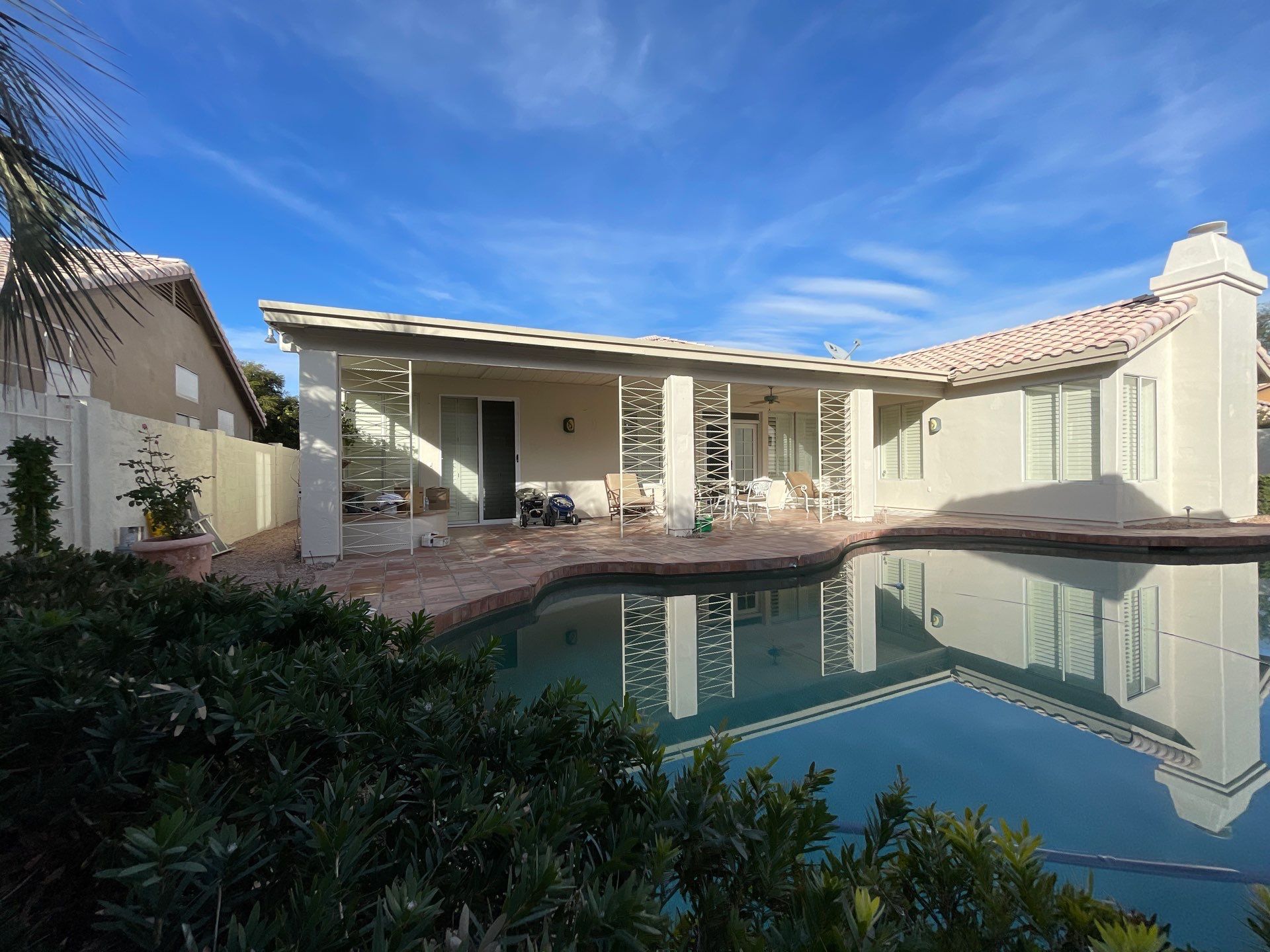 Gazzo - A Beautiful Home Exterior Transformation in Scottsdale, AZ with C&M Primer and Sherwin Williams Paints by Double G Painting Contractors, LLC