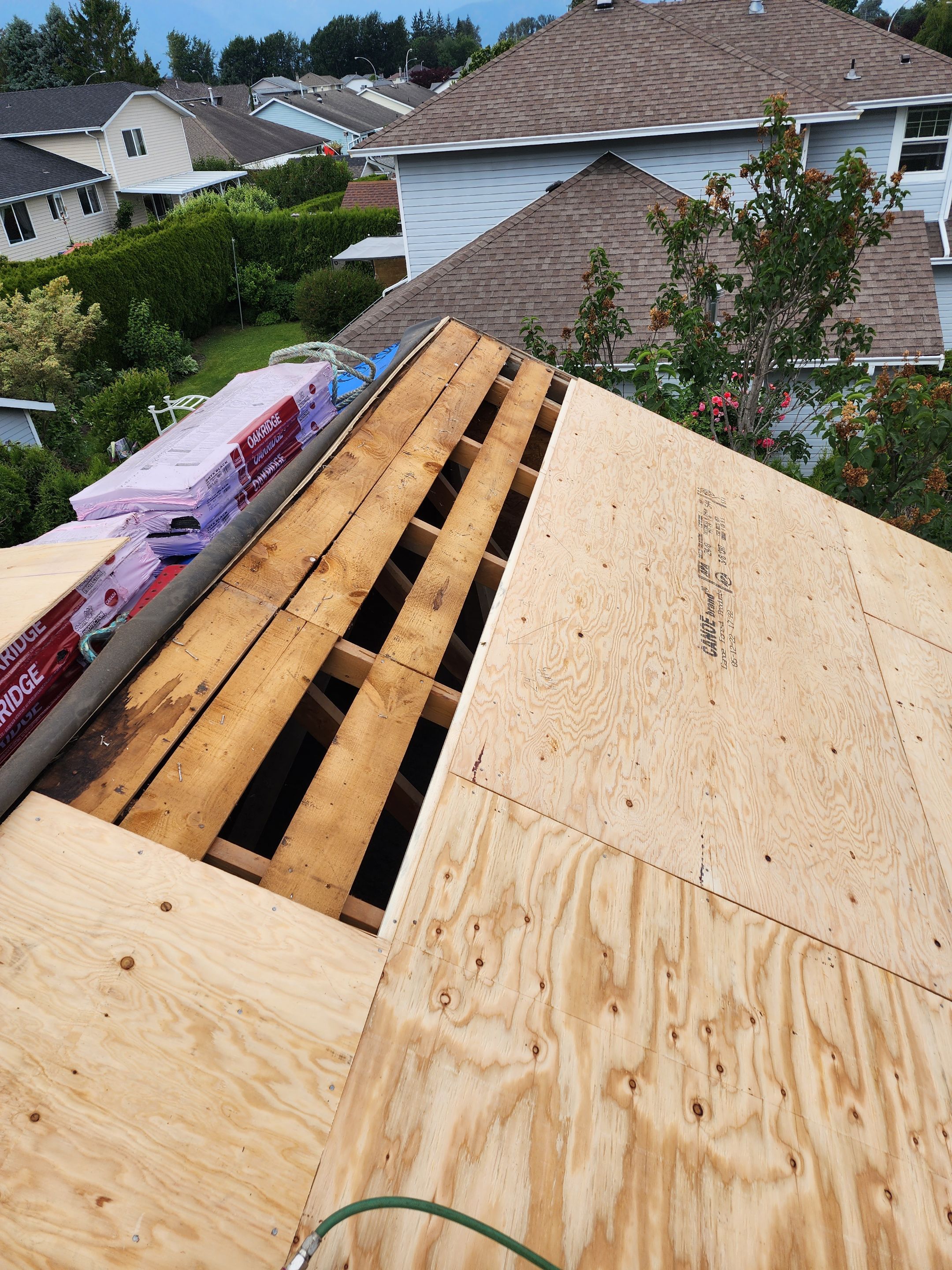 Residential Cedar ReRoofing Installation using OC Oakridge shingles by Top Notch Roofing Inc