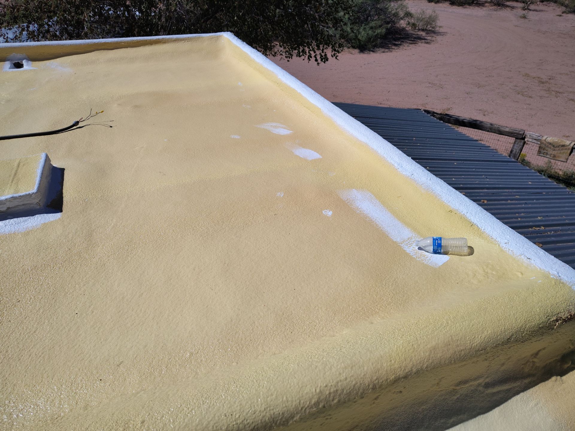 Residential roof application by SPF Services 