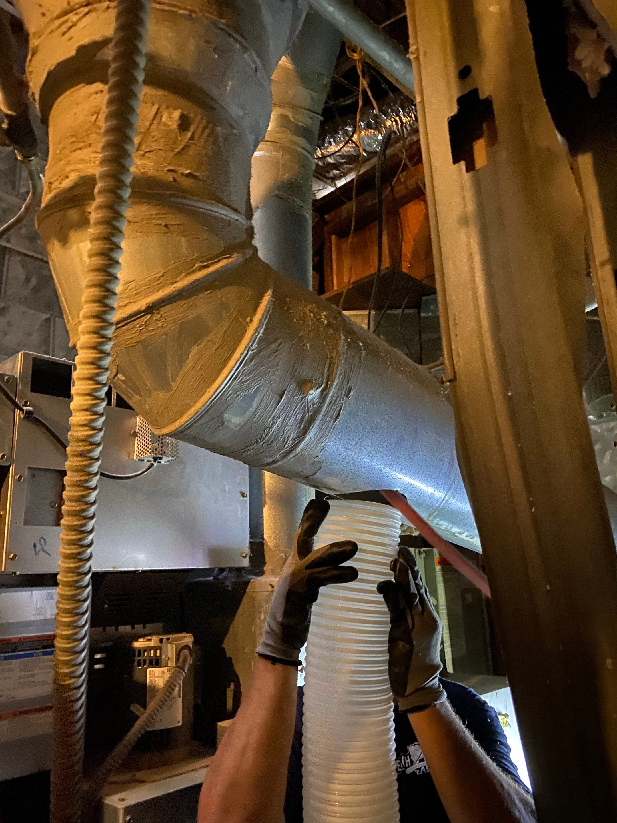 Laundromat Dryer Vent Deep Cleaning using Gas Powered Vac by Peach State Dryer Vents & Air Ducts