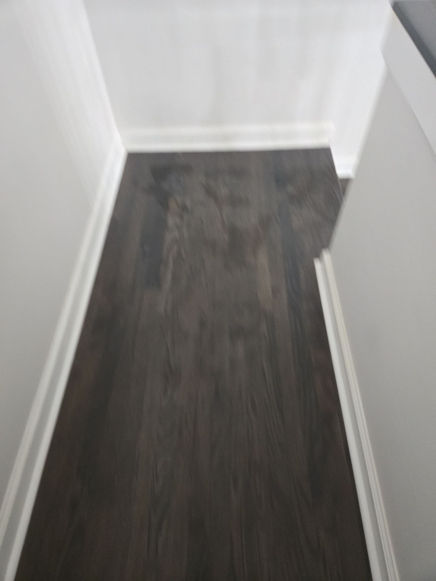 Updated staircase and hallway by Footprints Floors of Nashville