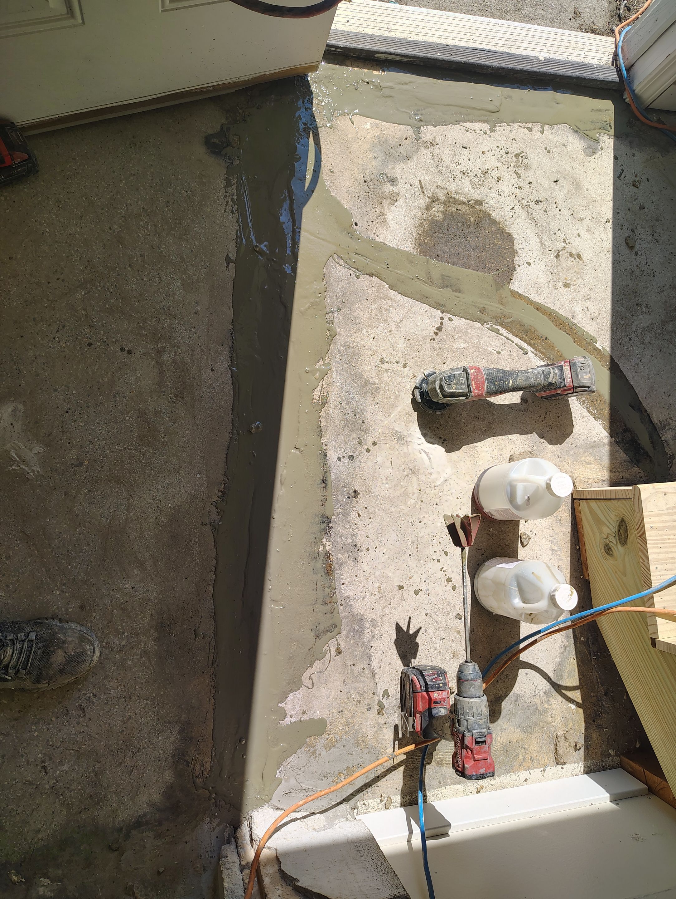 Comprehensive Basement Concrete Floor Coating and Crack Repair in Sioux Falls by Select Painting, Coatings & Garage Cabinets