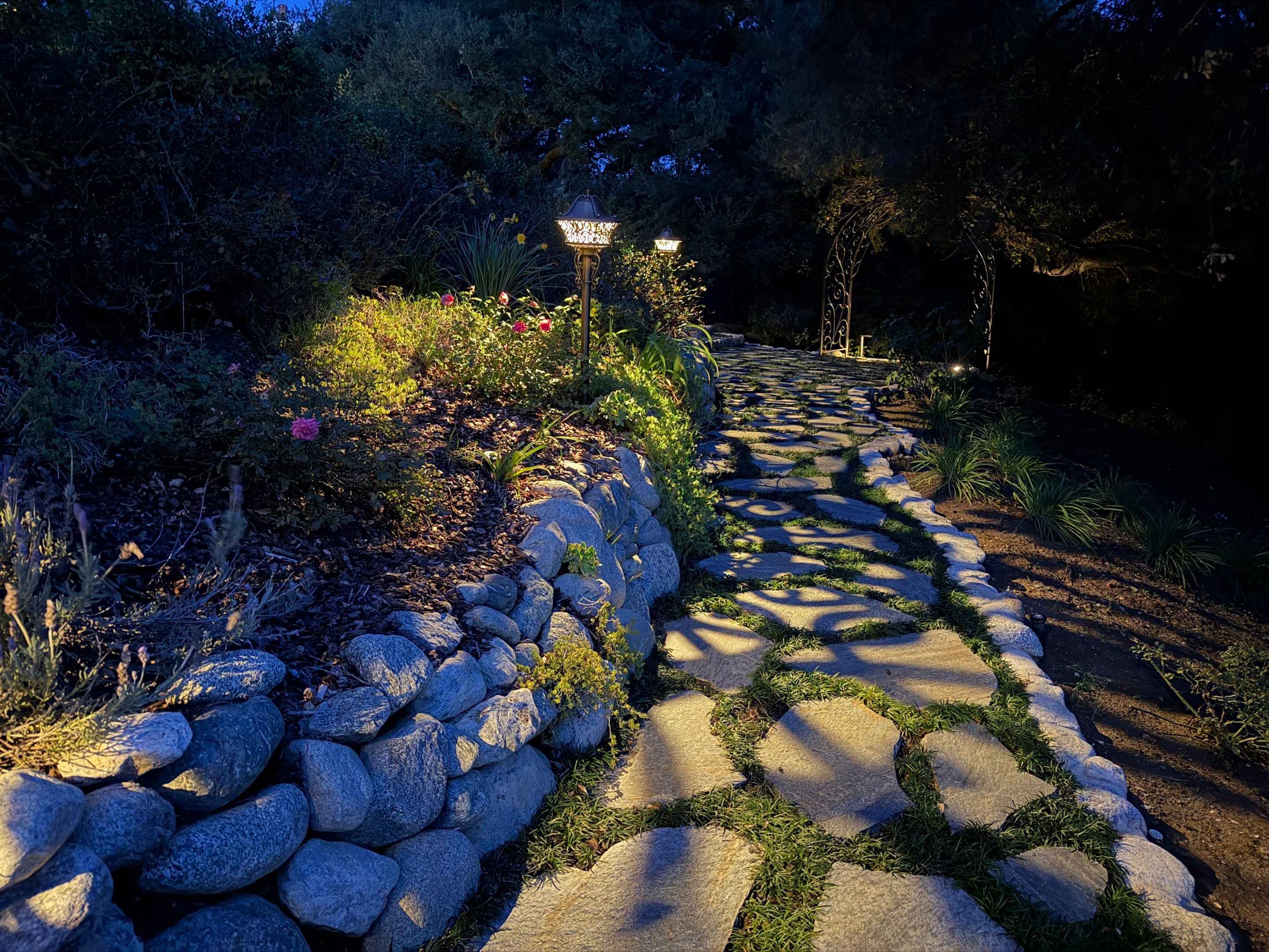 Tudor Estate Landscape Lighting with Integrated Stone Step Illumination by Outdoor Lights + Shades