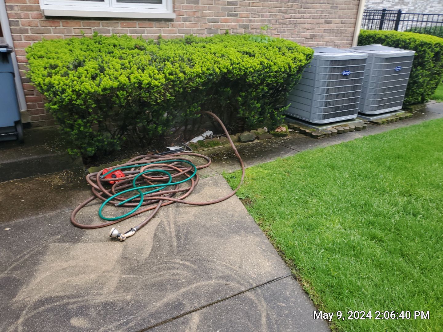 concrete patio, retaining wall, awning cleaning by Northern Power Washing LLC.