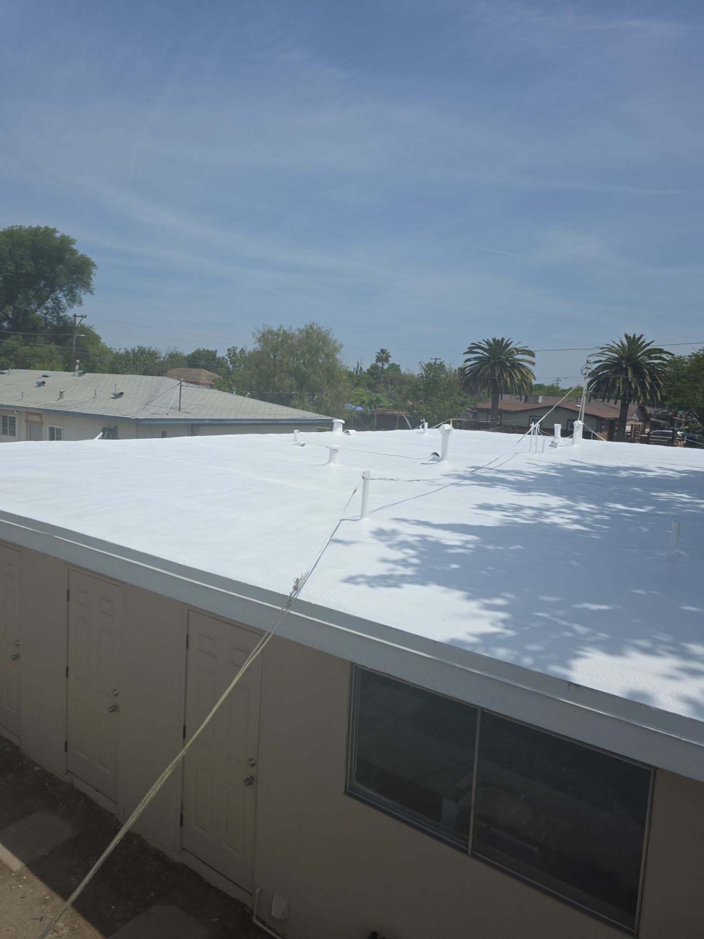 Foam Refurbish using Conklin Benchmark/PUMA XL coatings and spray foam by Straight Edge Roofing Inc