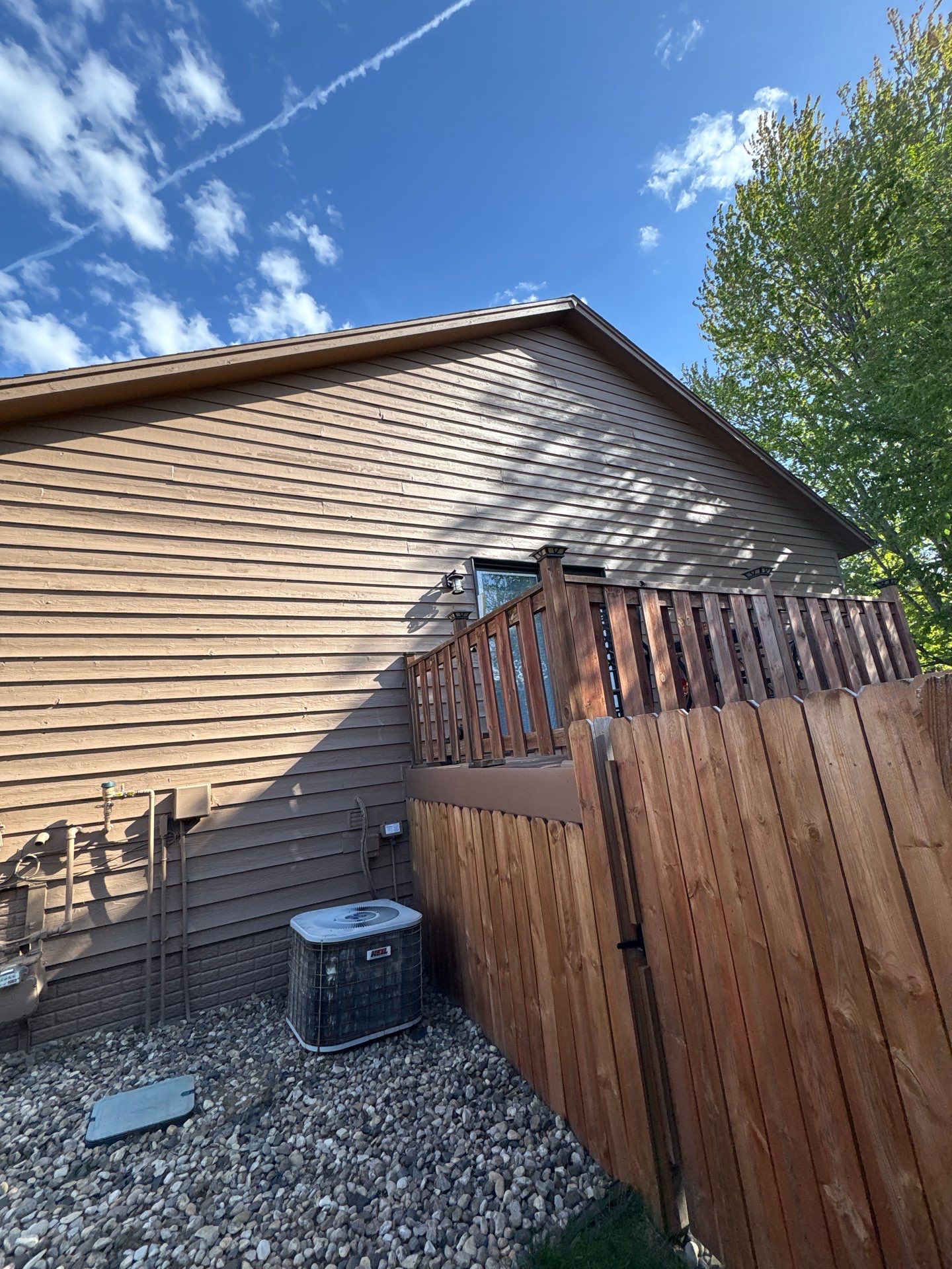Wood Siding Restoration and Exterior Painting in Sioux Falls by Select Painting, Coatings & Garage Cabinets