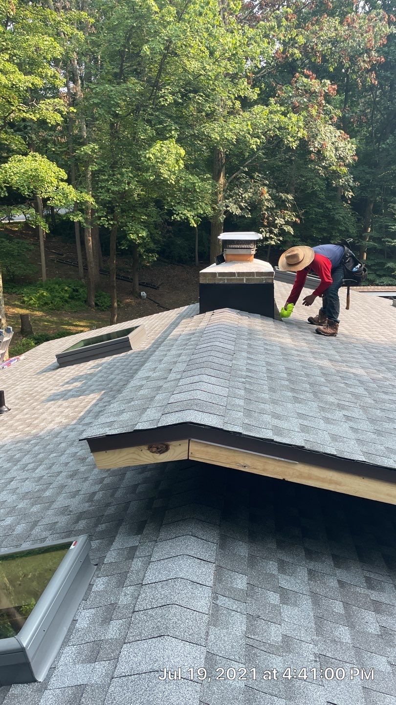 Deckhouse Roof Replacement by American Home Contractors