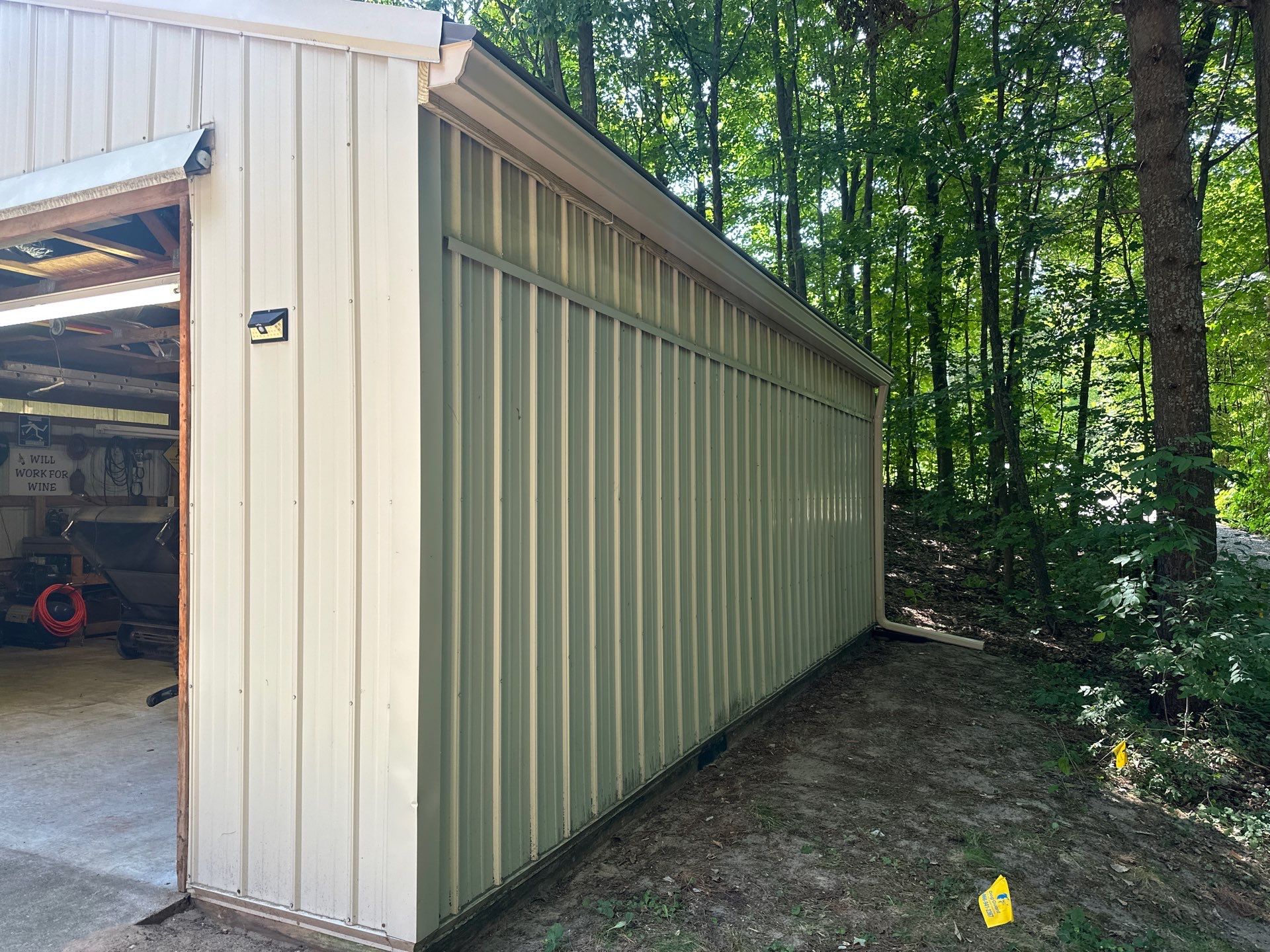 Custom Gutter and Downspout Installation for Traverse City Outbuilding by Rainbow Seamless Systems