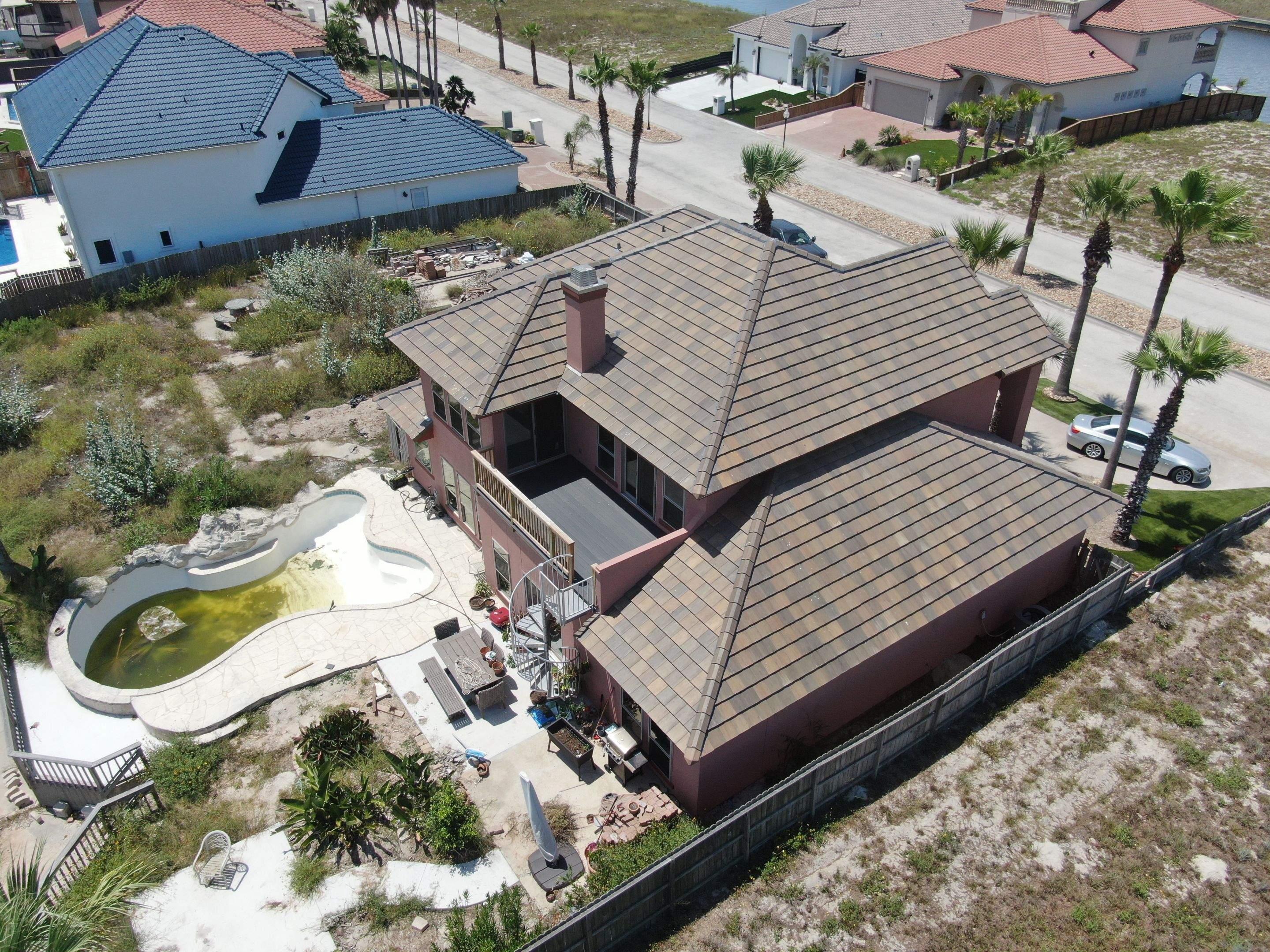 Busted to Beautiful! by Bayfront Roofing and Construction