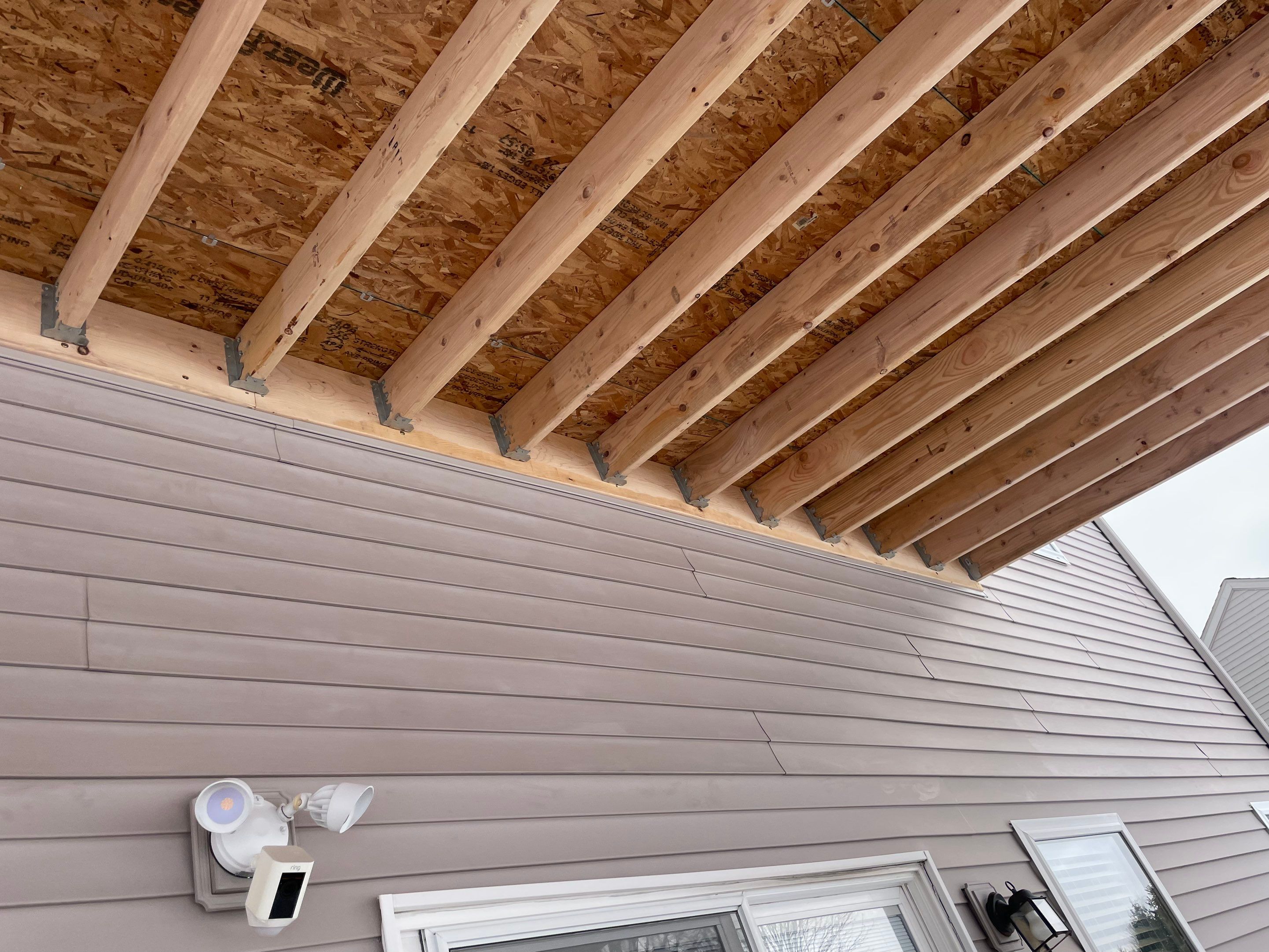 PATIO ROOF INSTALLATION using Treated Lumber by Avalon Roofing and Exteriors