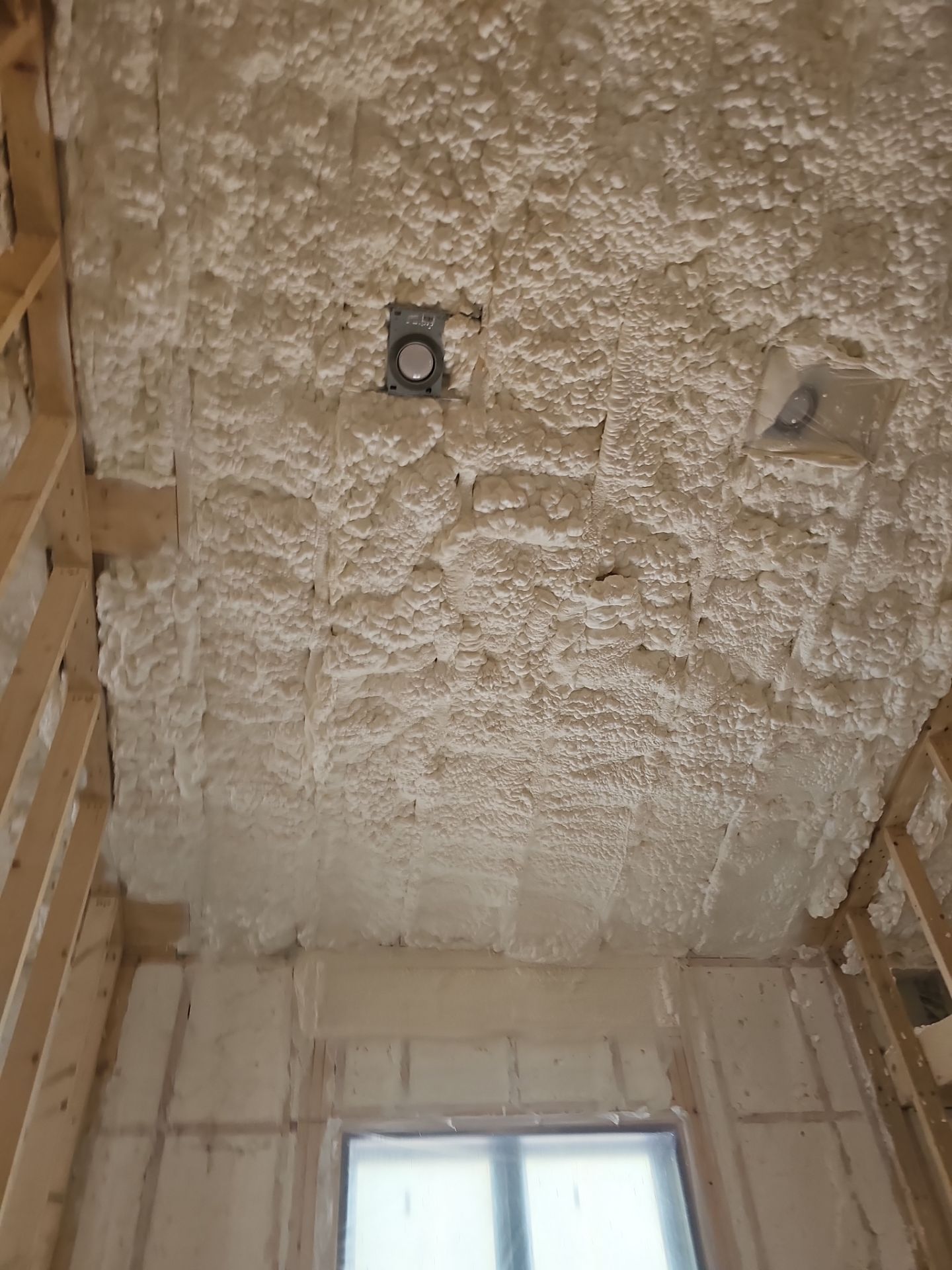 Spray Foam Insulation using open cell spray foam by NYS Foam & Energy