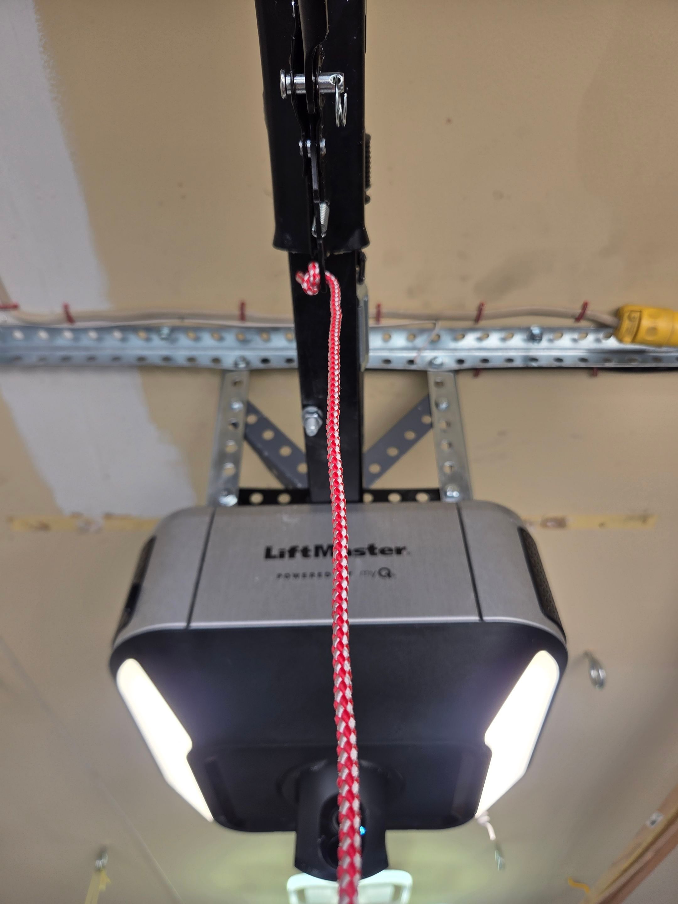 Wood-Grain Sectional Garage Door and LiftMaster Smart Opener Installation in Pleasanton by Valiant Garage Door
