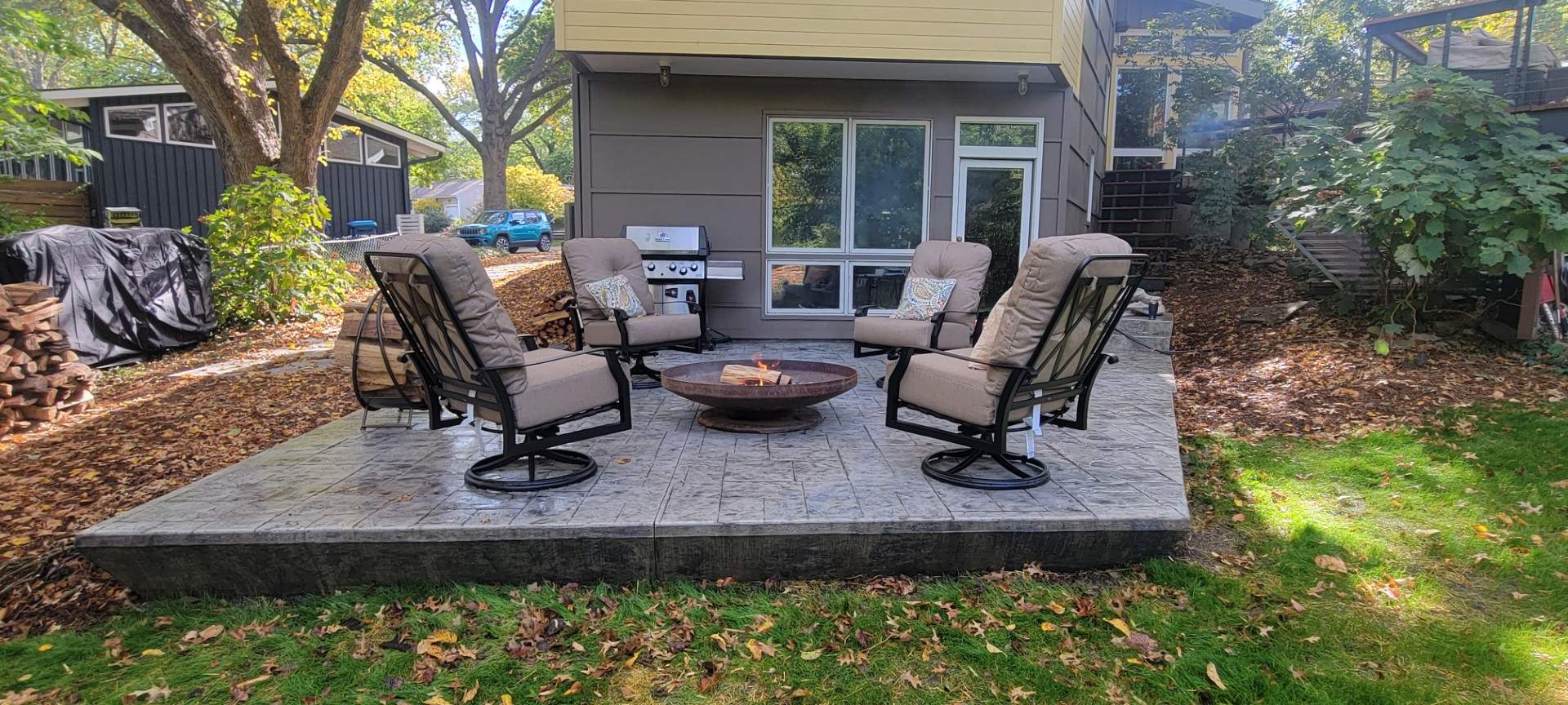 Back Yard Cantilivered Patio by LAND ESCAPES LLC