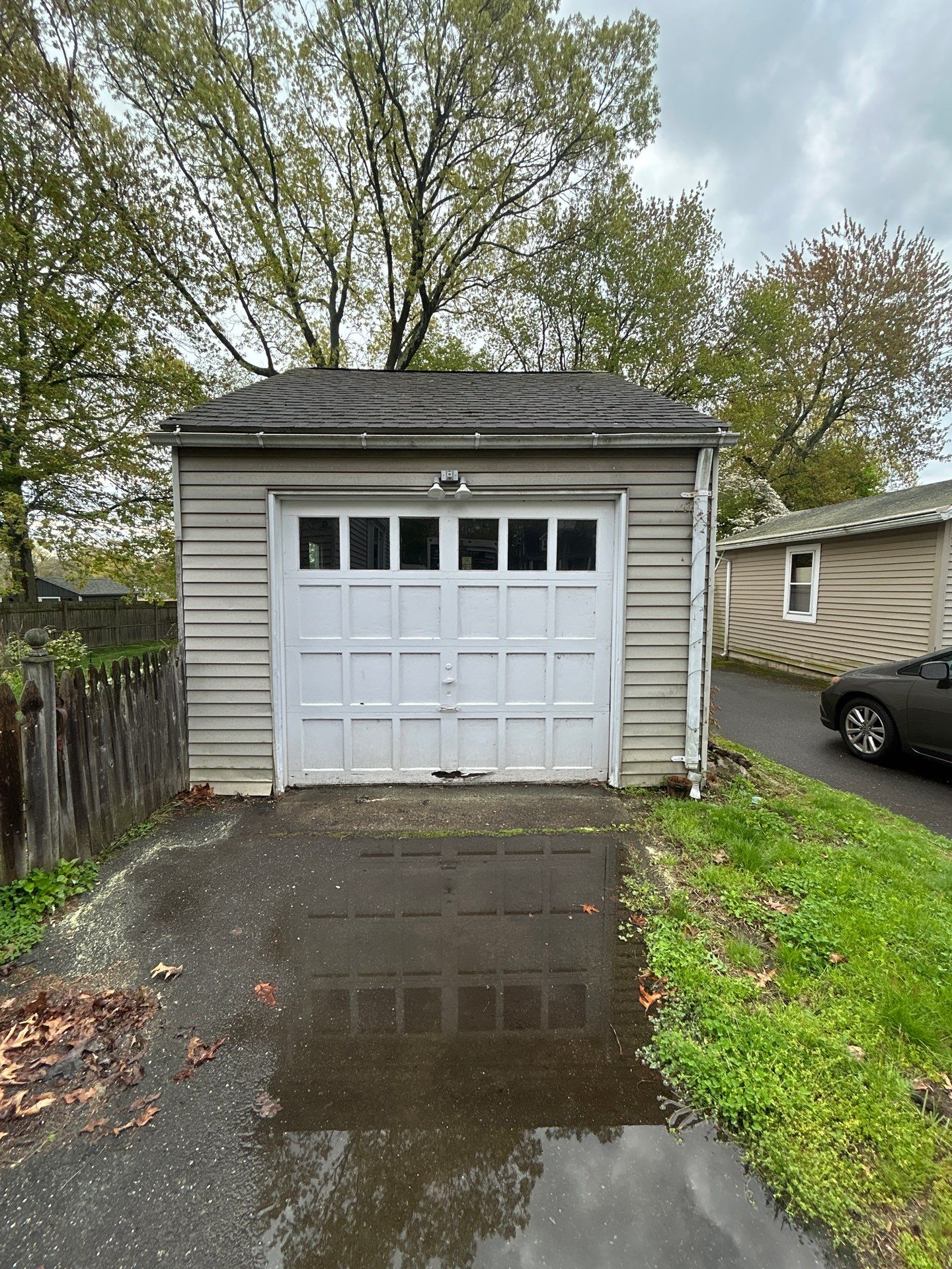 Garage Door Upgrade with Decorative Window Inserts by DiGiorgi Roofing and Siding Inc