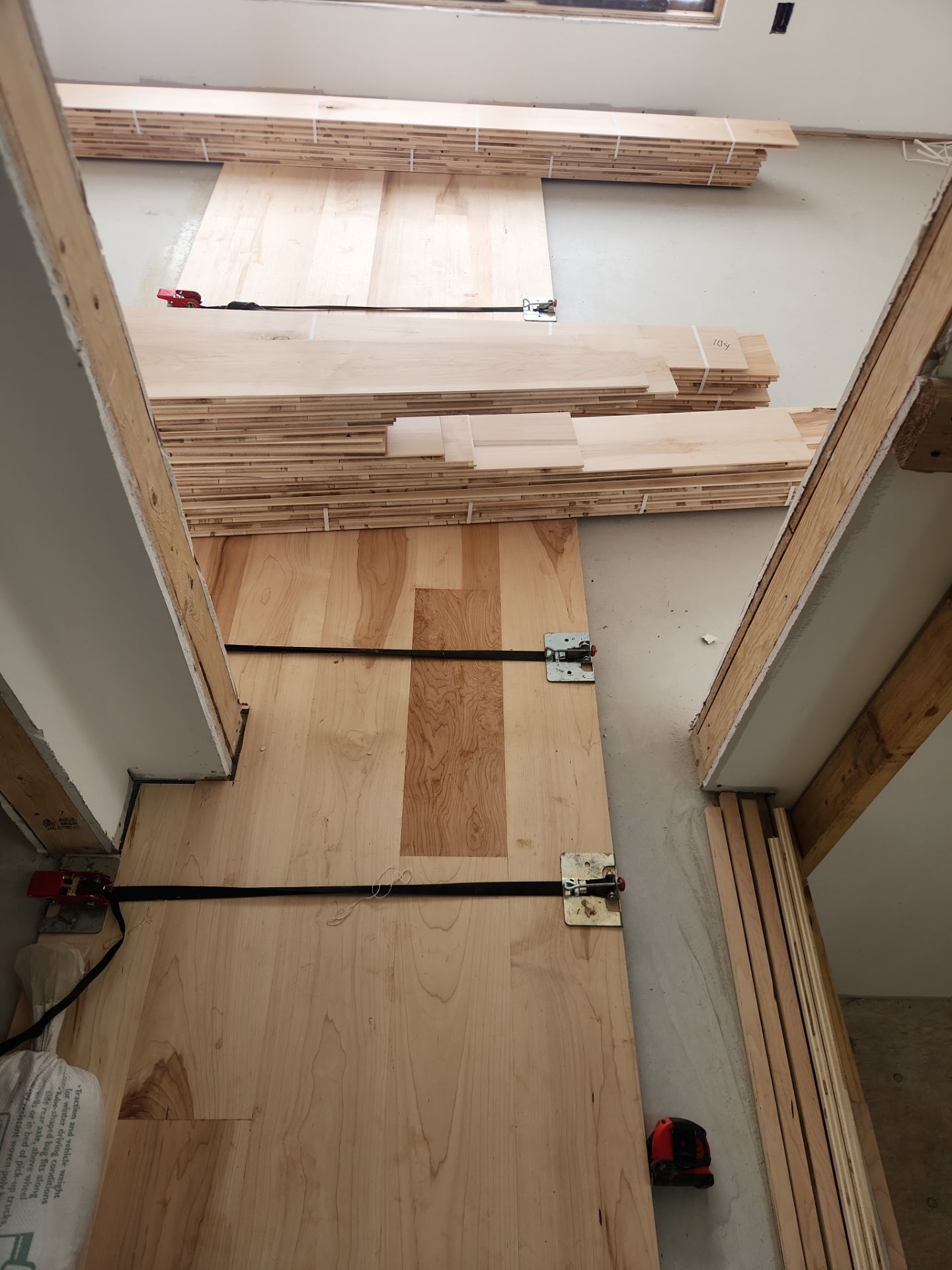 Full glue down Installation over radiant heat 7" Maple character grade by Ann Arbor Hardwoods 