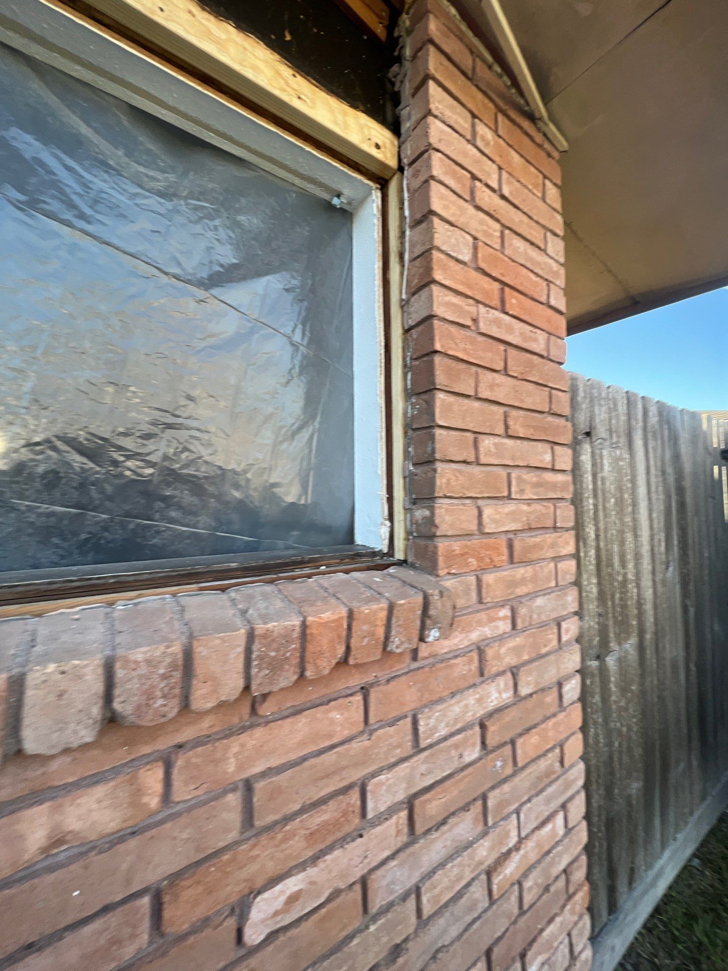 Windows in Brick with a Bay Window by Bayfront Roofing and Construction